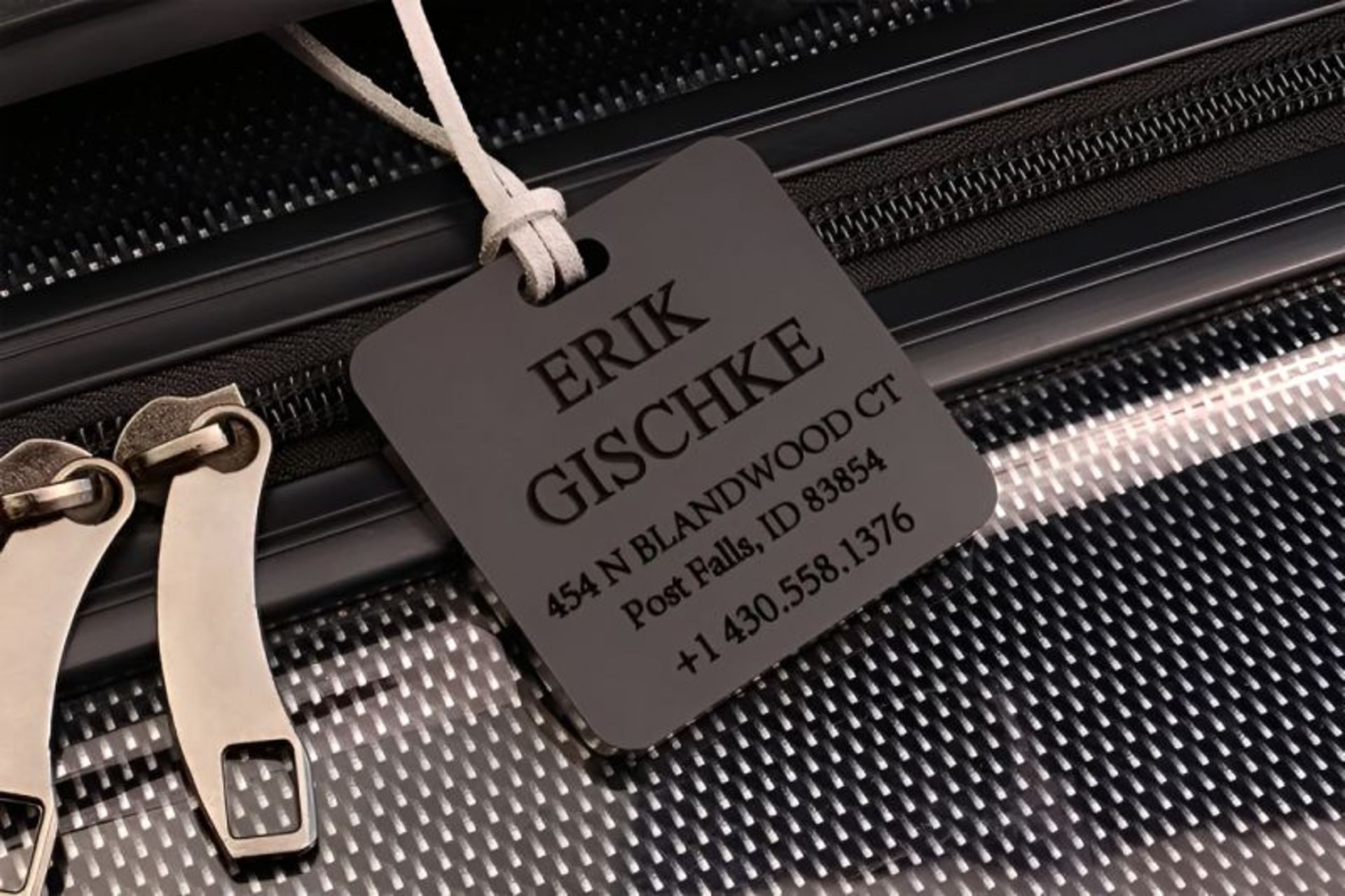 Tag of individual characteristics and individual information attached to the suitcase