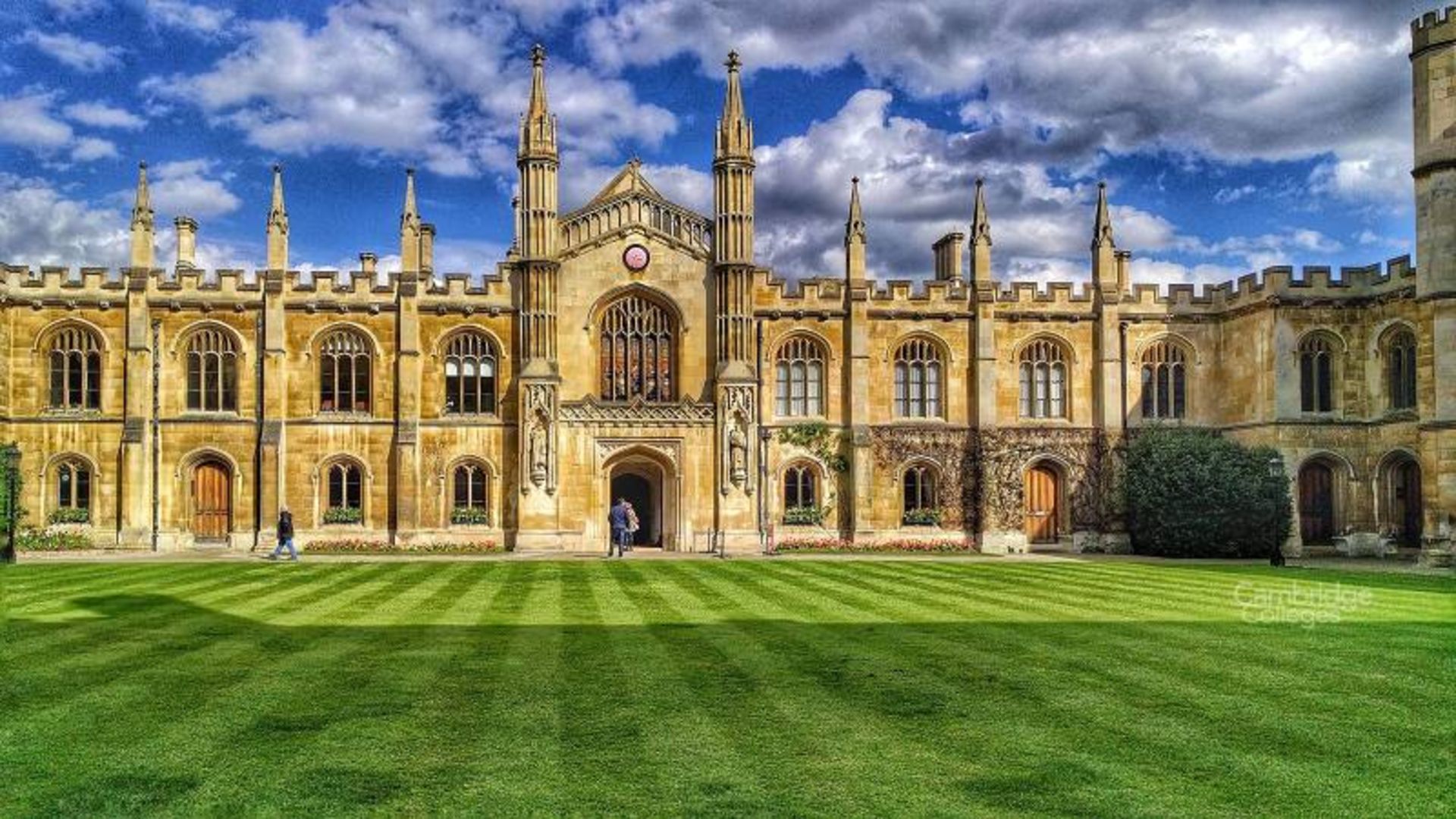 Cambridge University building and green space on sunny day