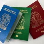 Three electronic passports with blue, green and crimson