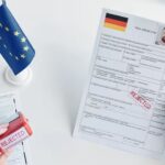 Red Regular stamp on a man's visa