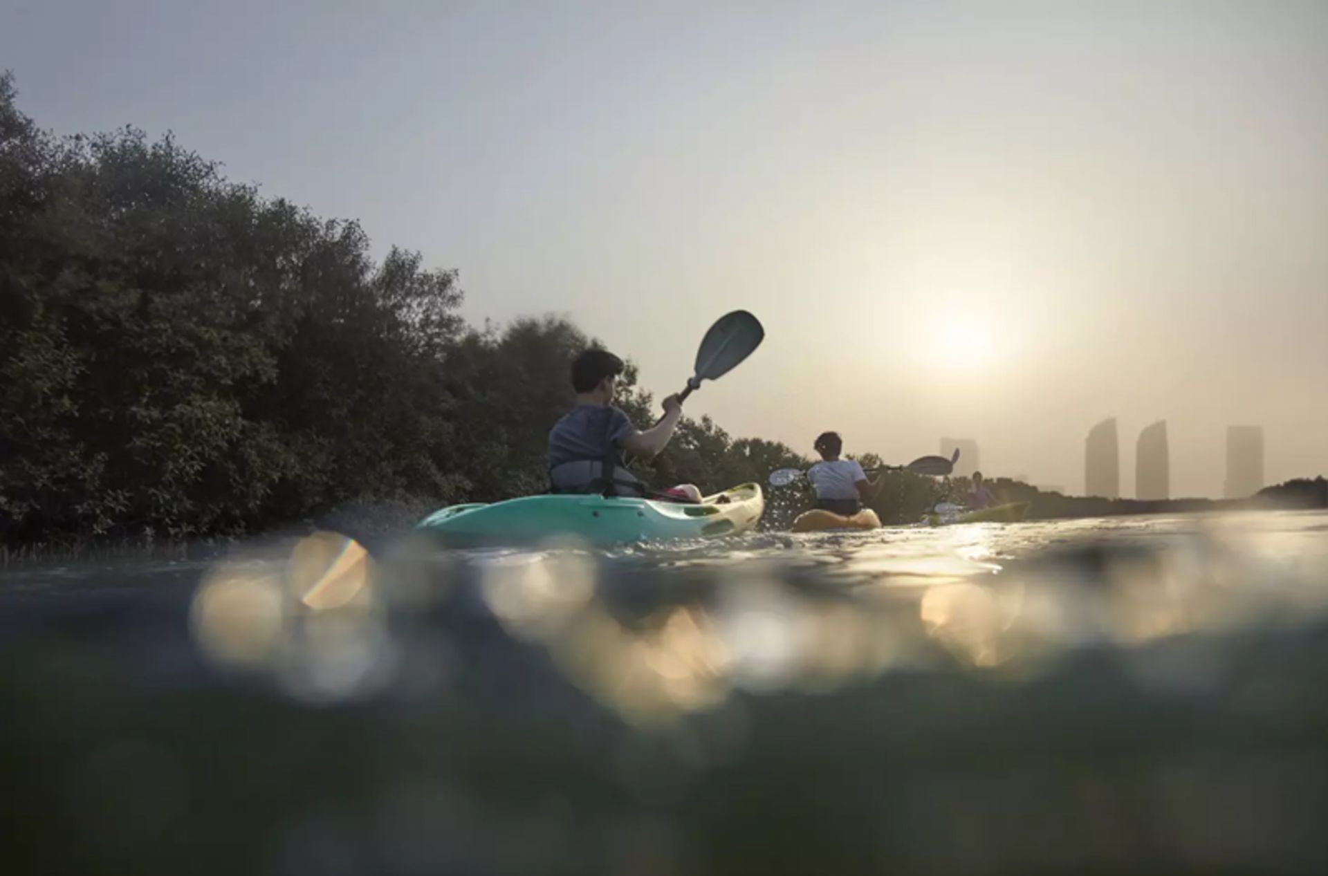 Kayak ride in Abu Dhabi waters at dusk