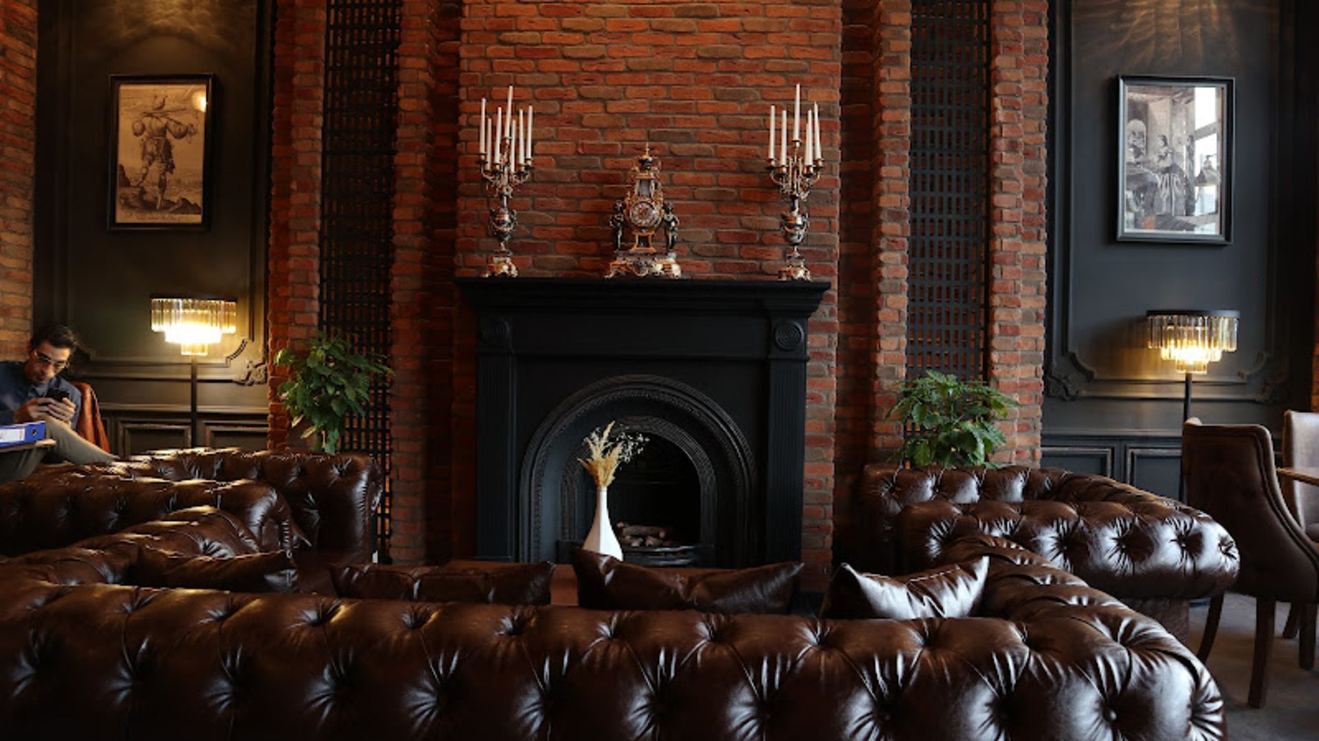 Leather and fireplace furniture at Rich Restaura Cafe