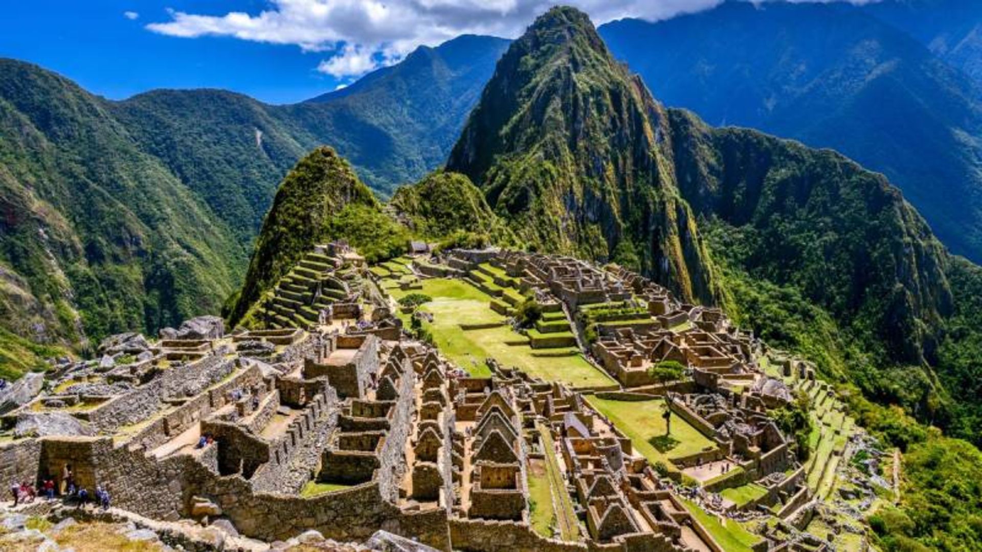 Tourists visiting the ancie site of Machu Pico