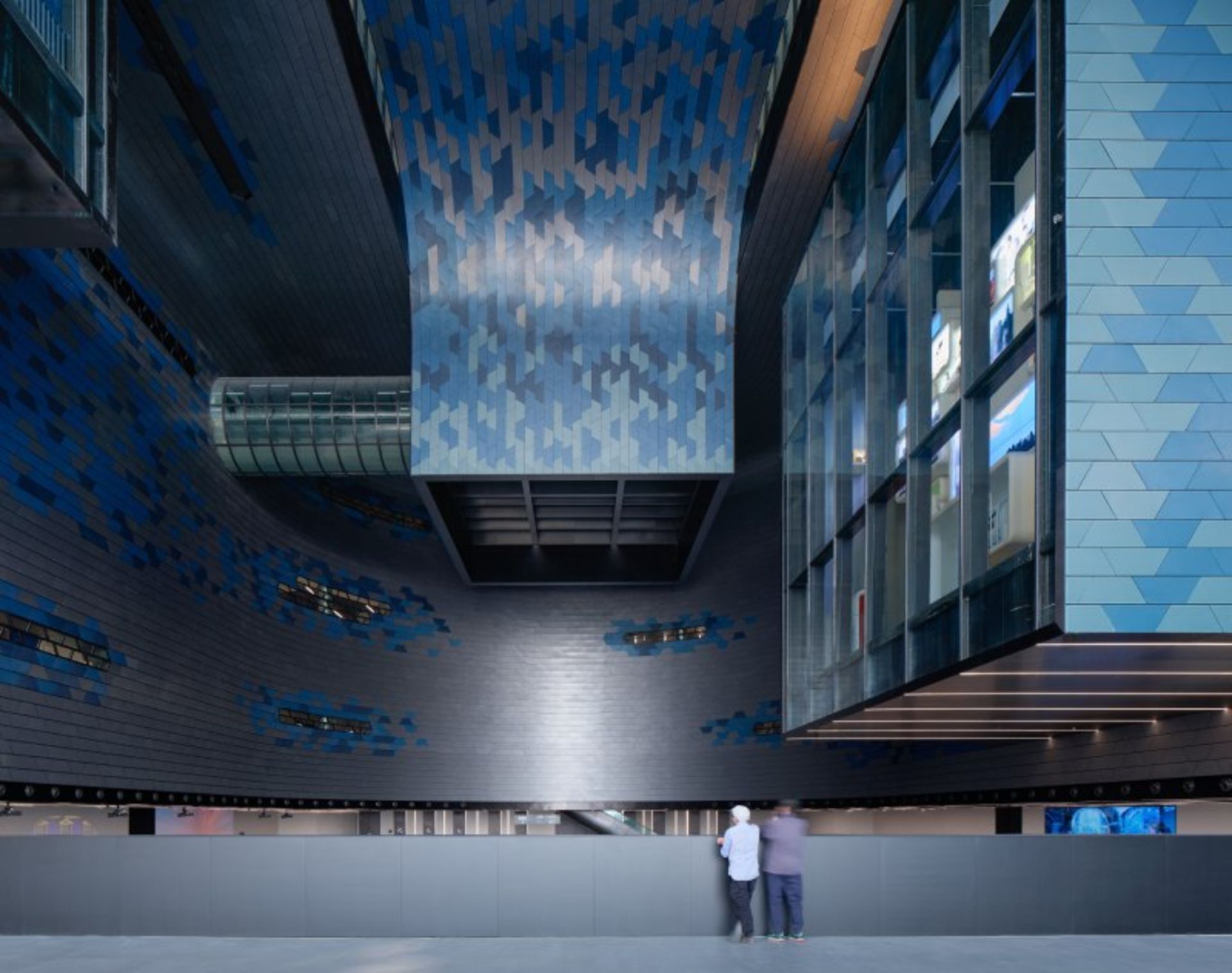Visitors watching Shenzhen Museum of Science and Technology