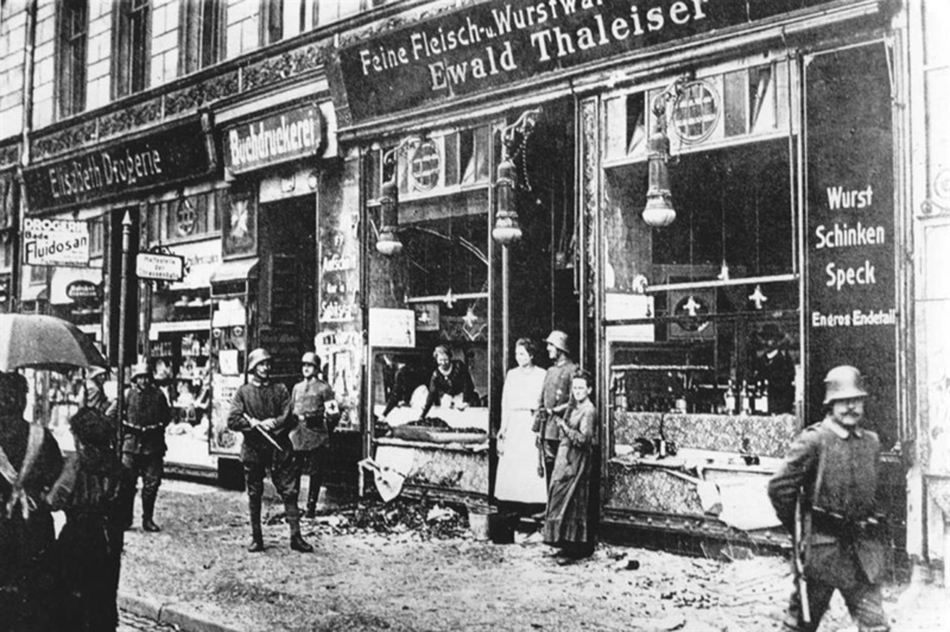 Old photo of people and butcher shop in Hamburg War time
