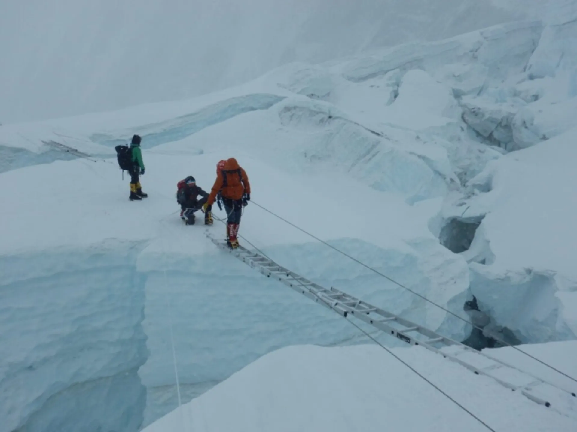 Climbers crossing the ice gap in Everest Mouain