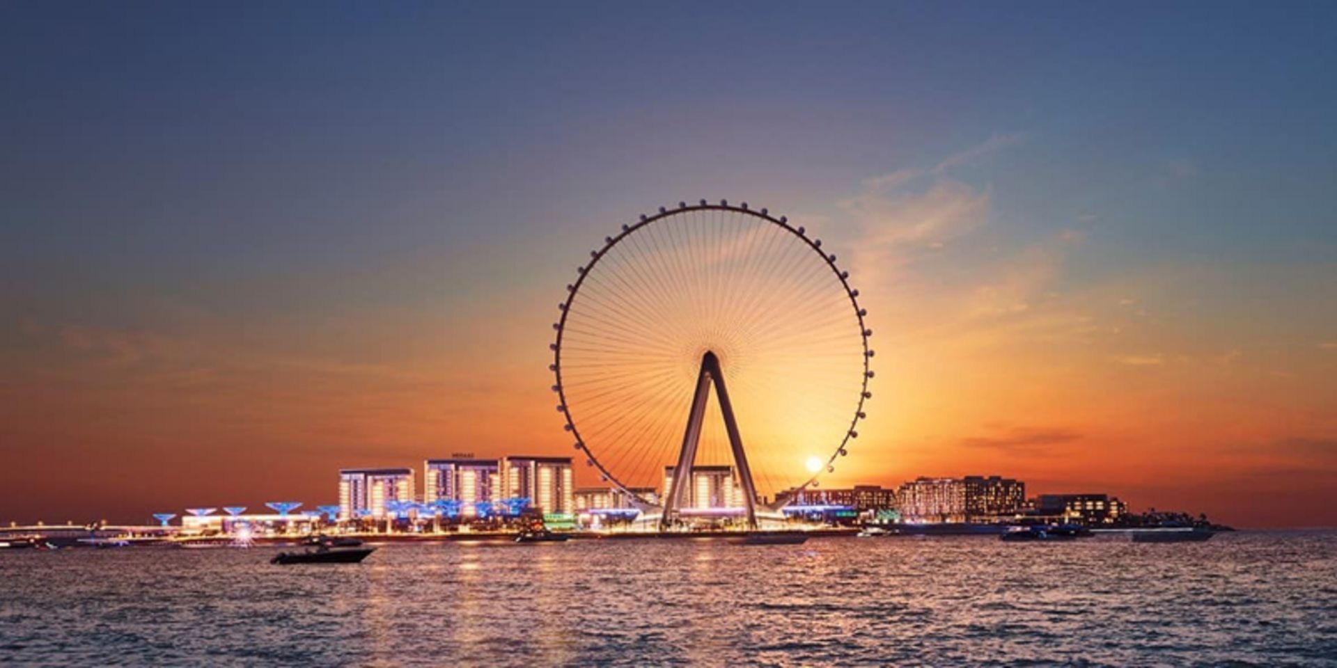 Dubai's Eye Wheel and Carousel in Sunset