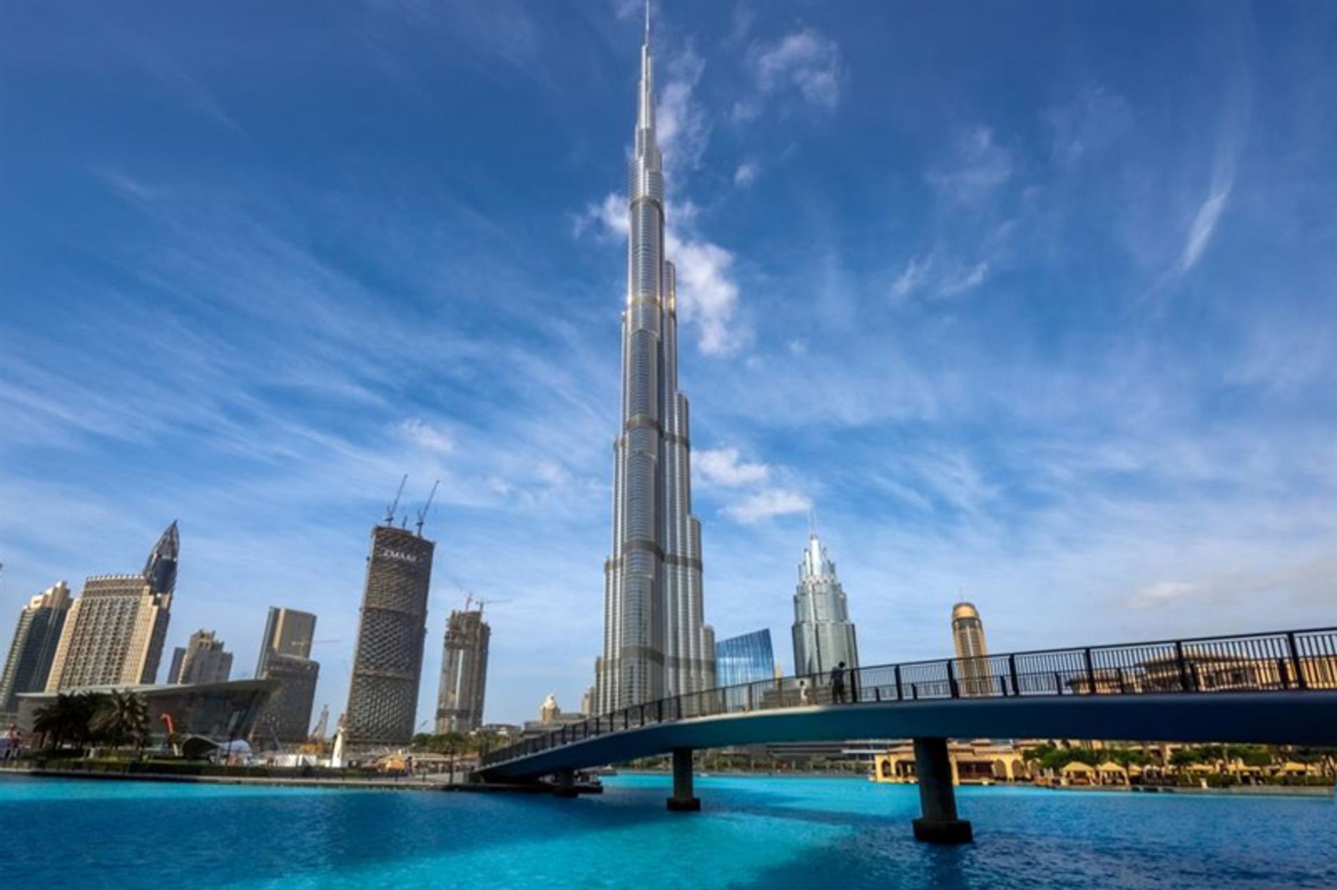 Dubai's Caliph Tower on the side of the lake