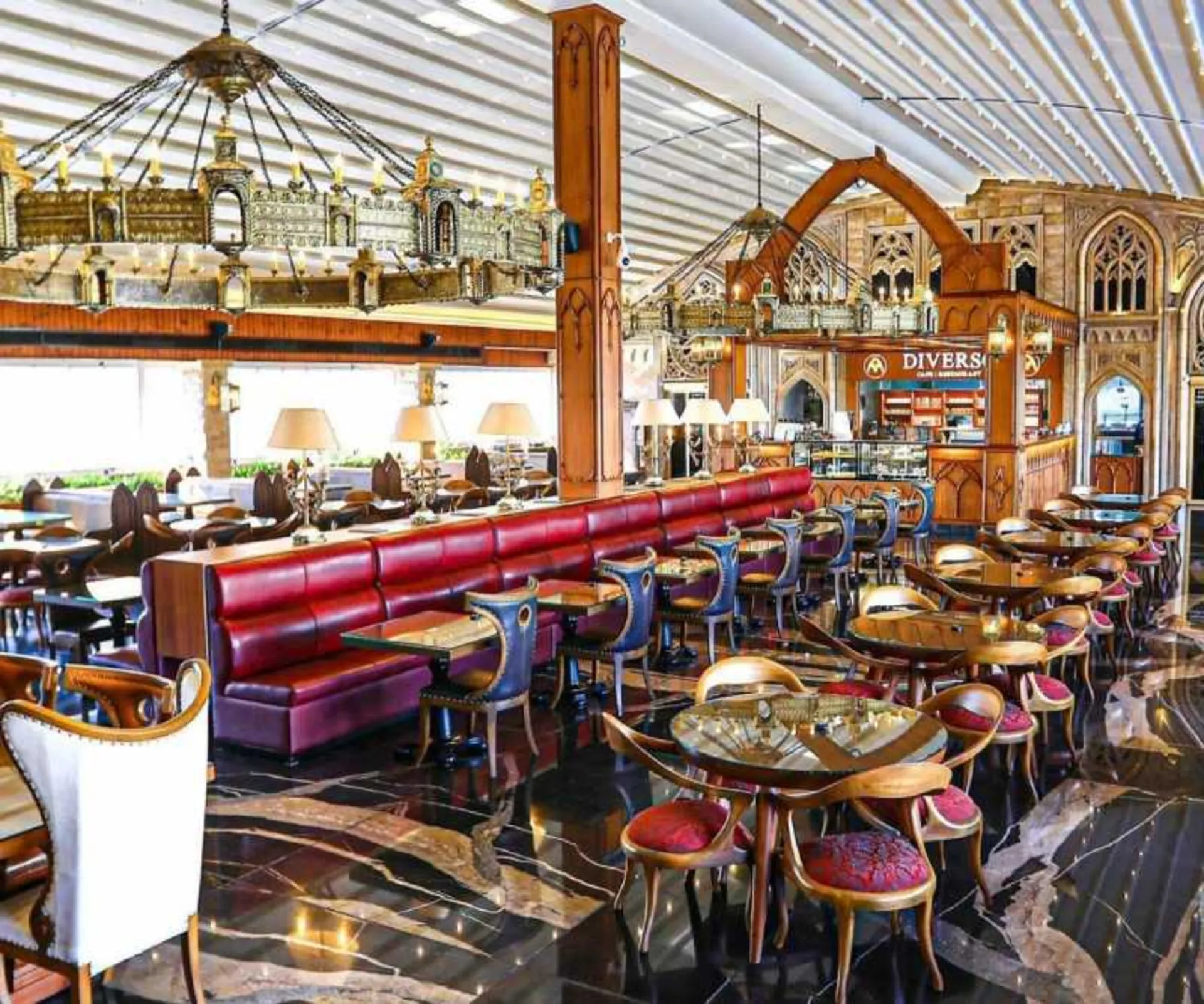 Tables and chairs in the café hall of Diorso Restaura