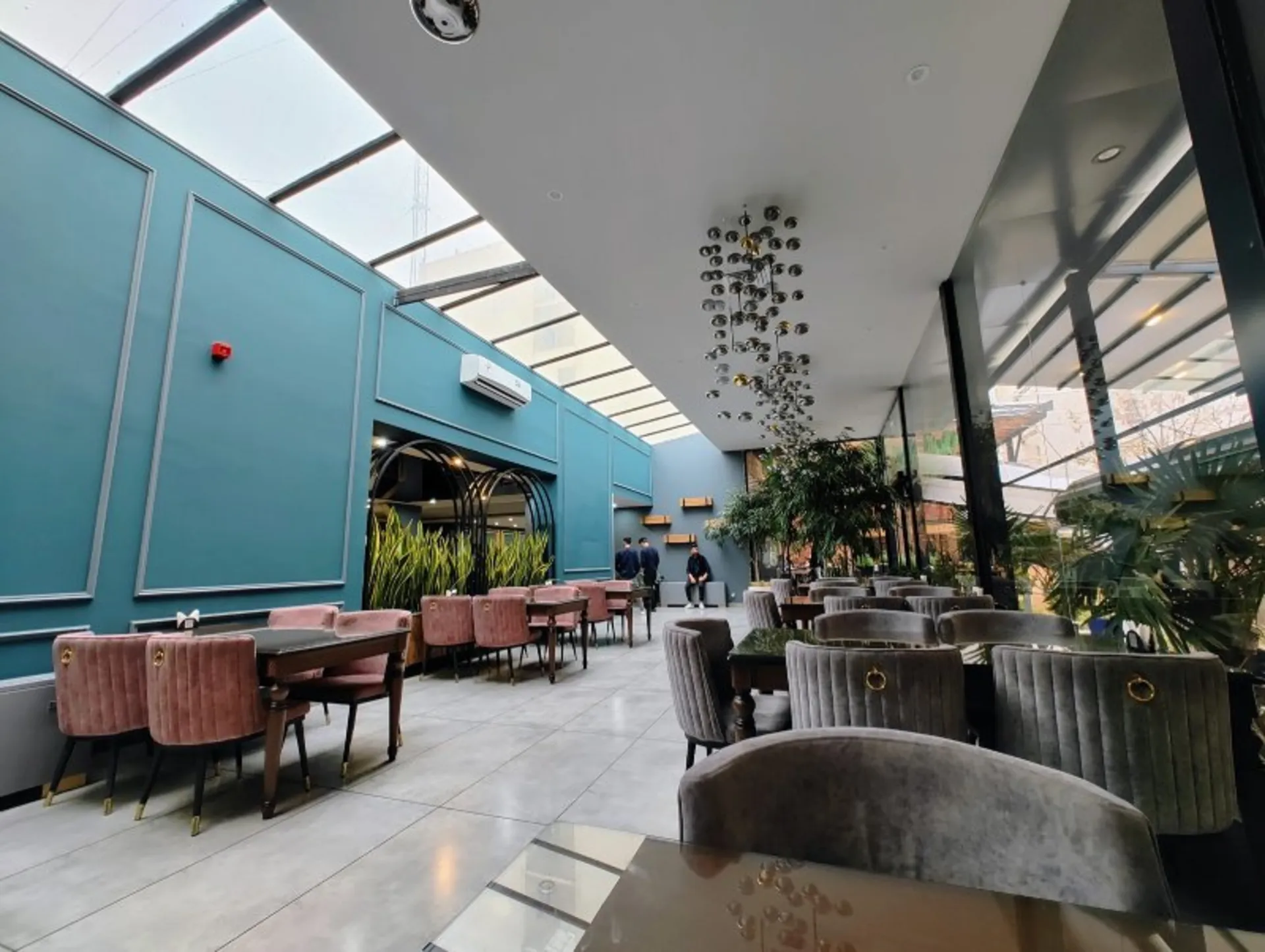 Tables and chairs in the café hall of the restaura