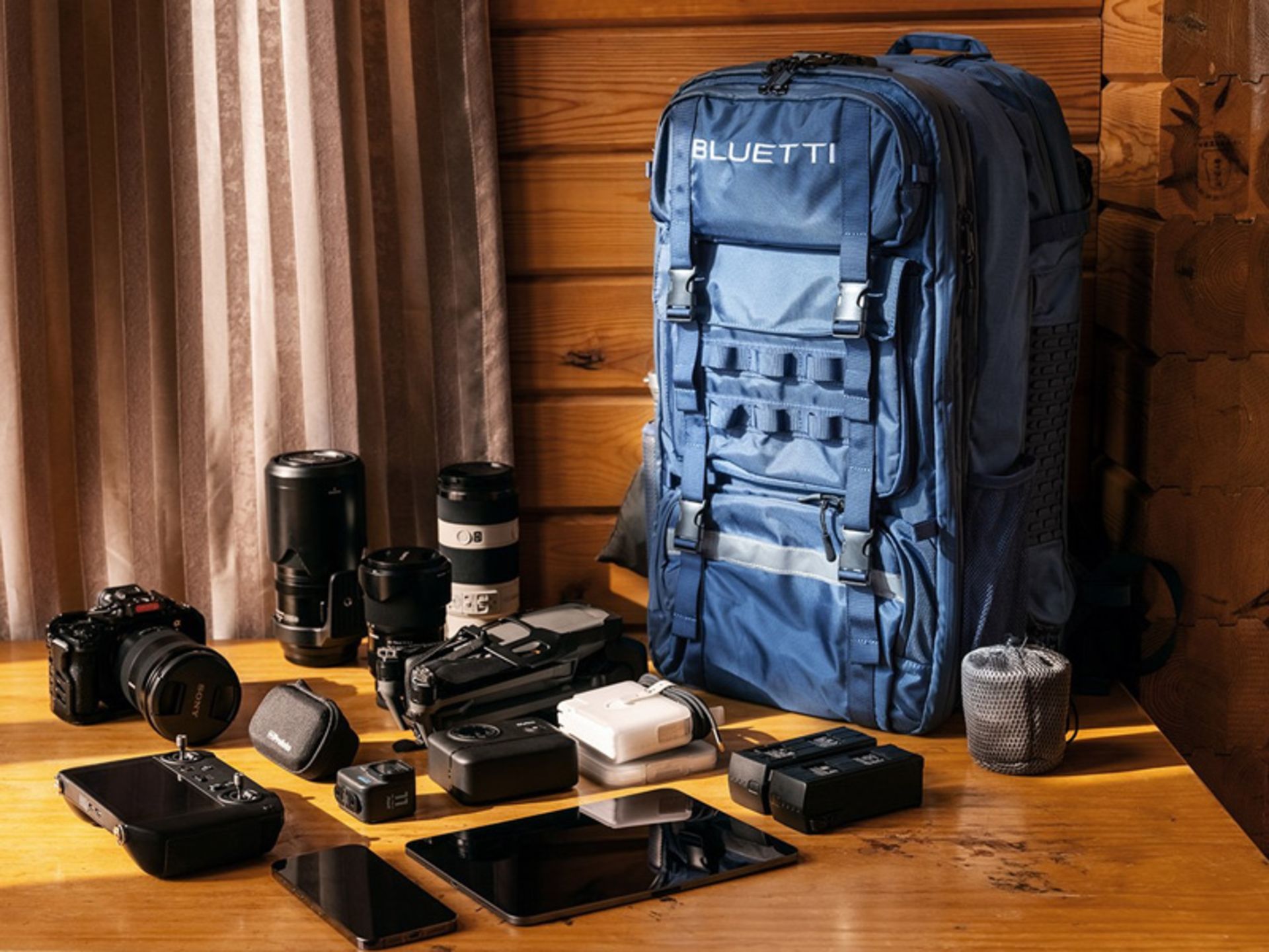 Bluetooth backpack next to electronic equipme