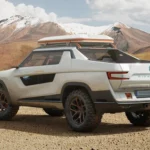 The back view of the white Honda Ridgeline pickup