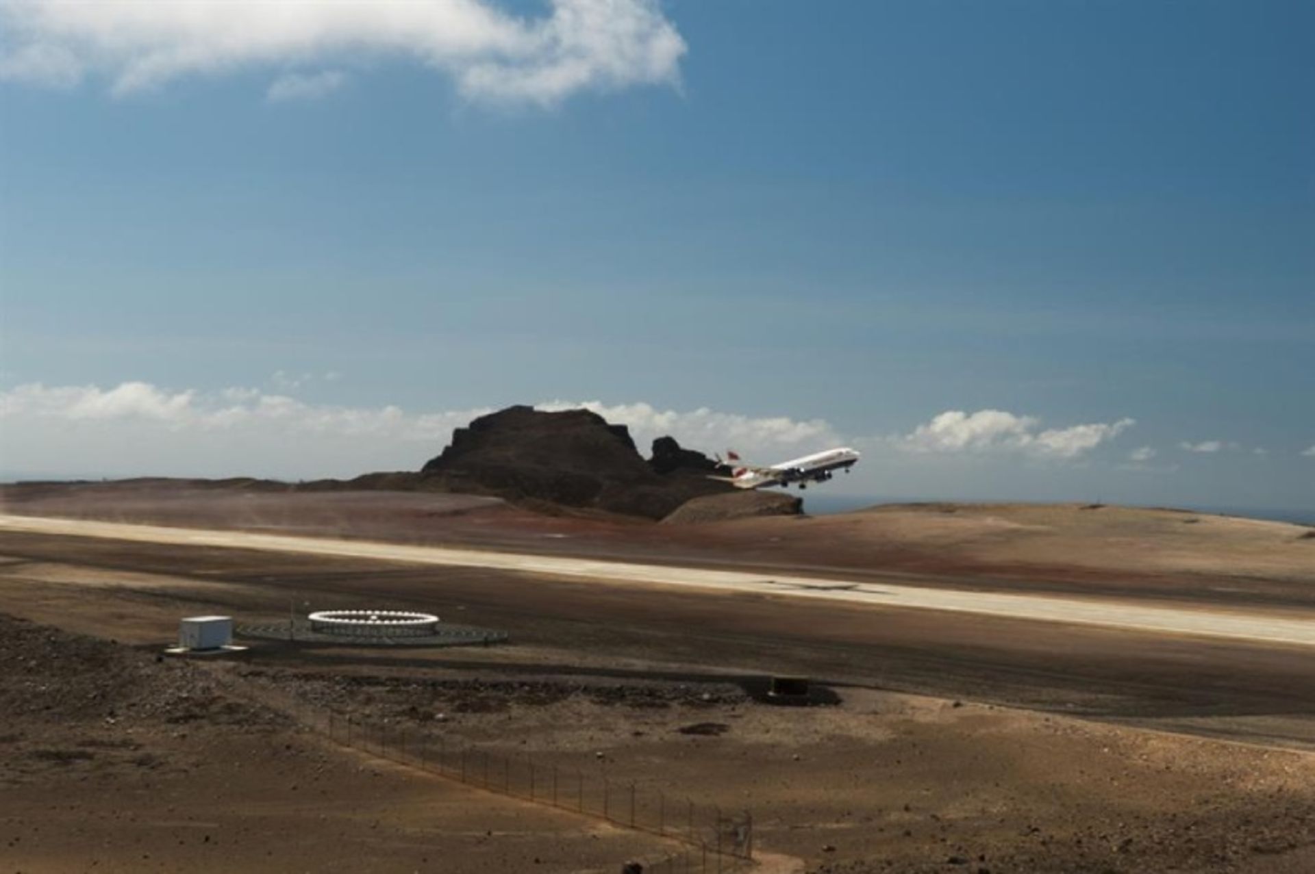 Airplane on the runway of St. Helena airport in the Atlaic Ocean