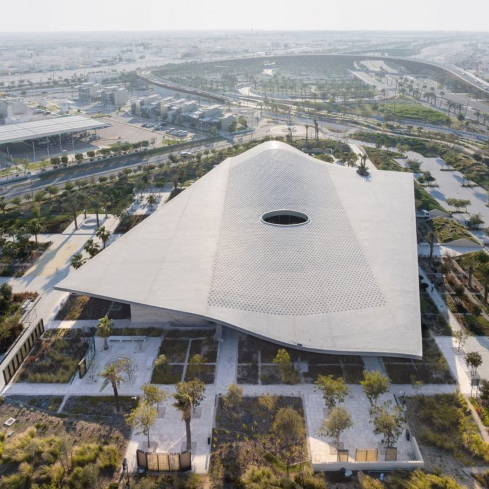 Aerial photo of the mesh roof of the ceer and Al-Mujadalah Mosque in Qatar