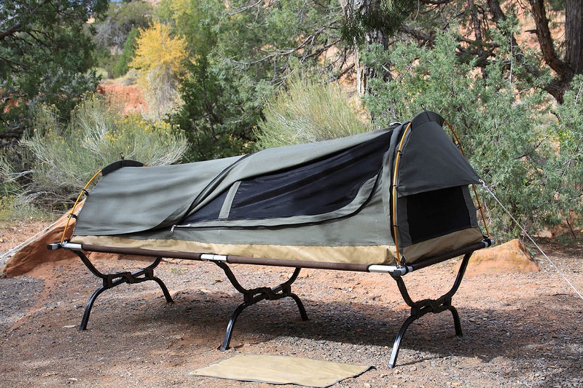 Swag te and sleeping bag on wooden table
