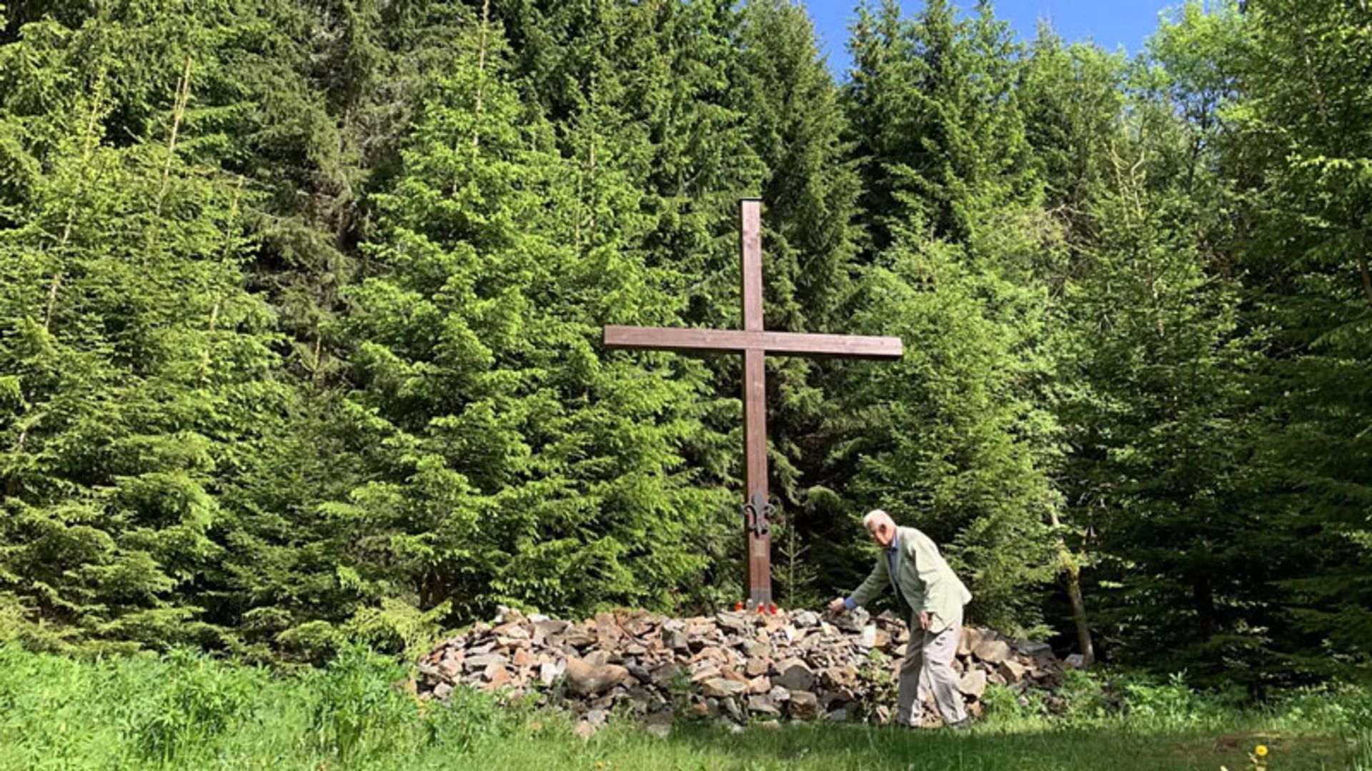 High wooden cross in Yakhimov nature