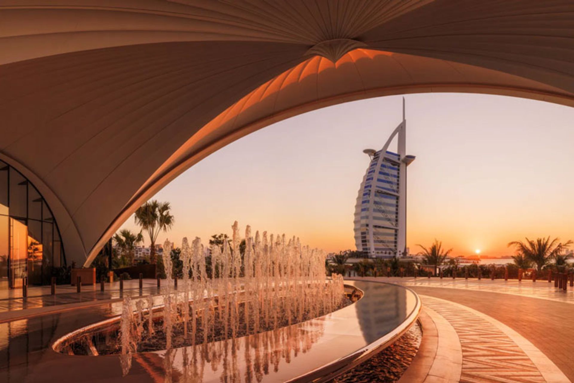 The erance of Jumeirah Mursi Al Arab Hotel with a view of Burj Al Arab