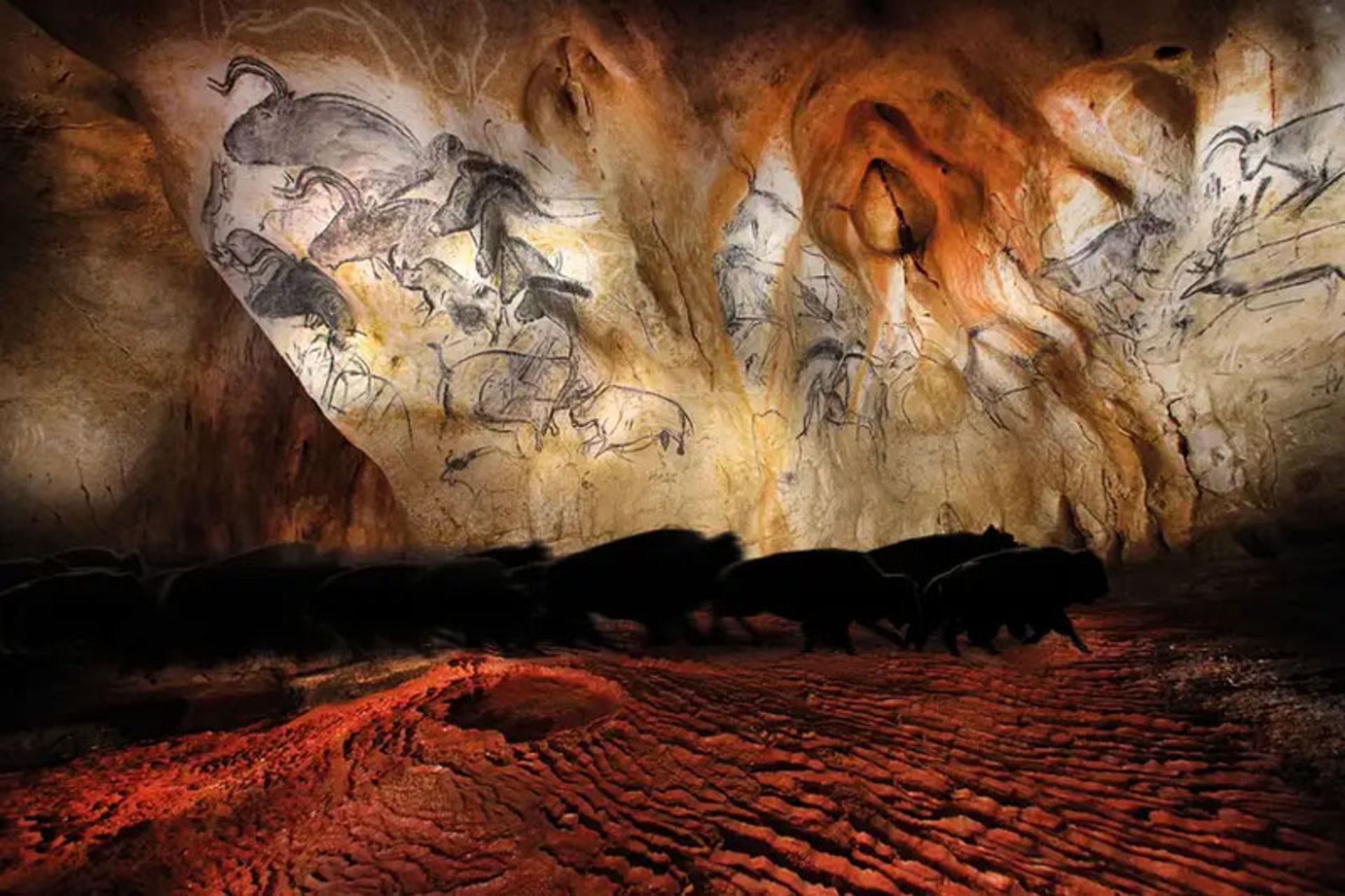 The image of old ancient art motifs on the rocks and the images of animals on these rocks