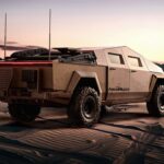 Back view of Keith Sting on Cybertruck in desert environment