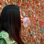 A person chewing bubble gum