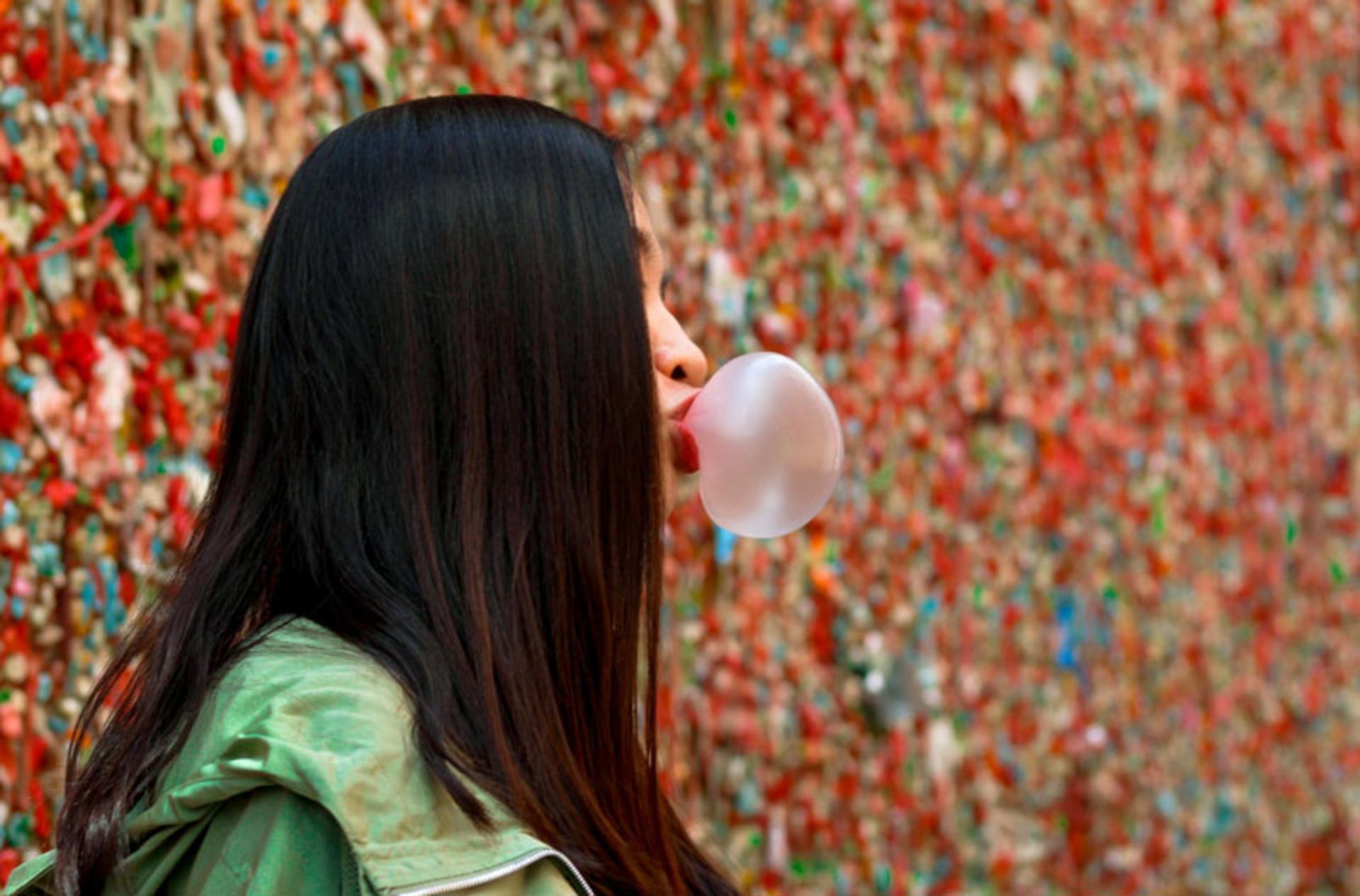 A person chewing bubble gum