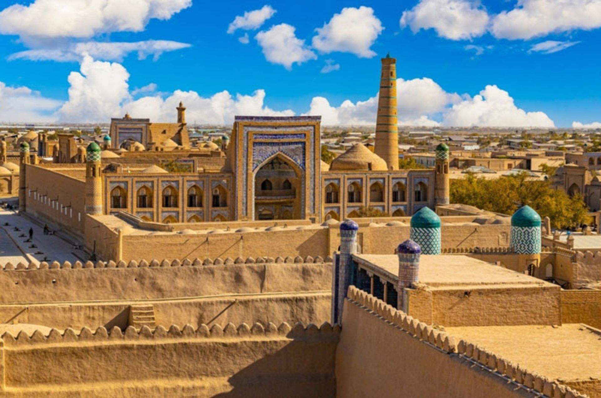 Ancie architecture of Khiva, Uzbekistan with minarets and adobe walls