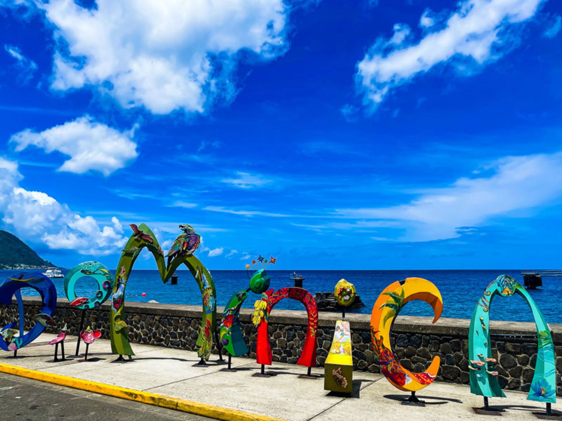 Artistic and colorful paiing of Dominica along the coastline