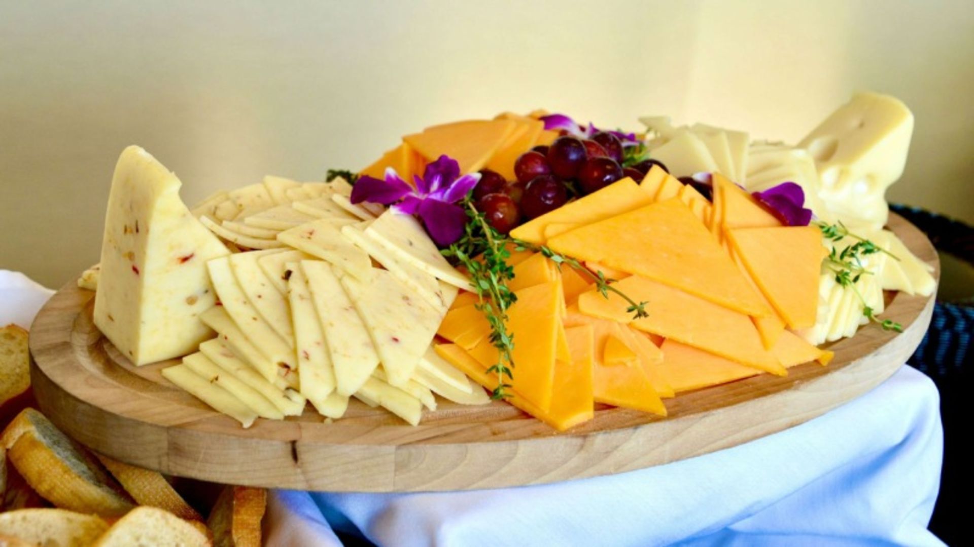 A wooden sheet cheese board