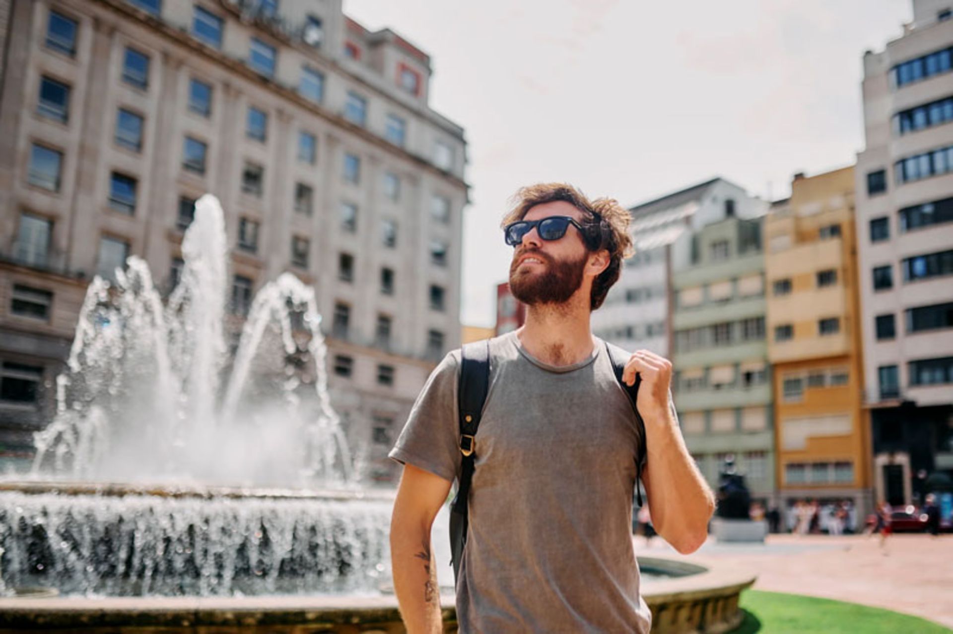 A man watching the surroundings while traveling