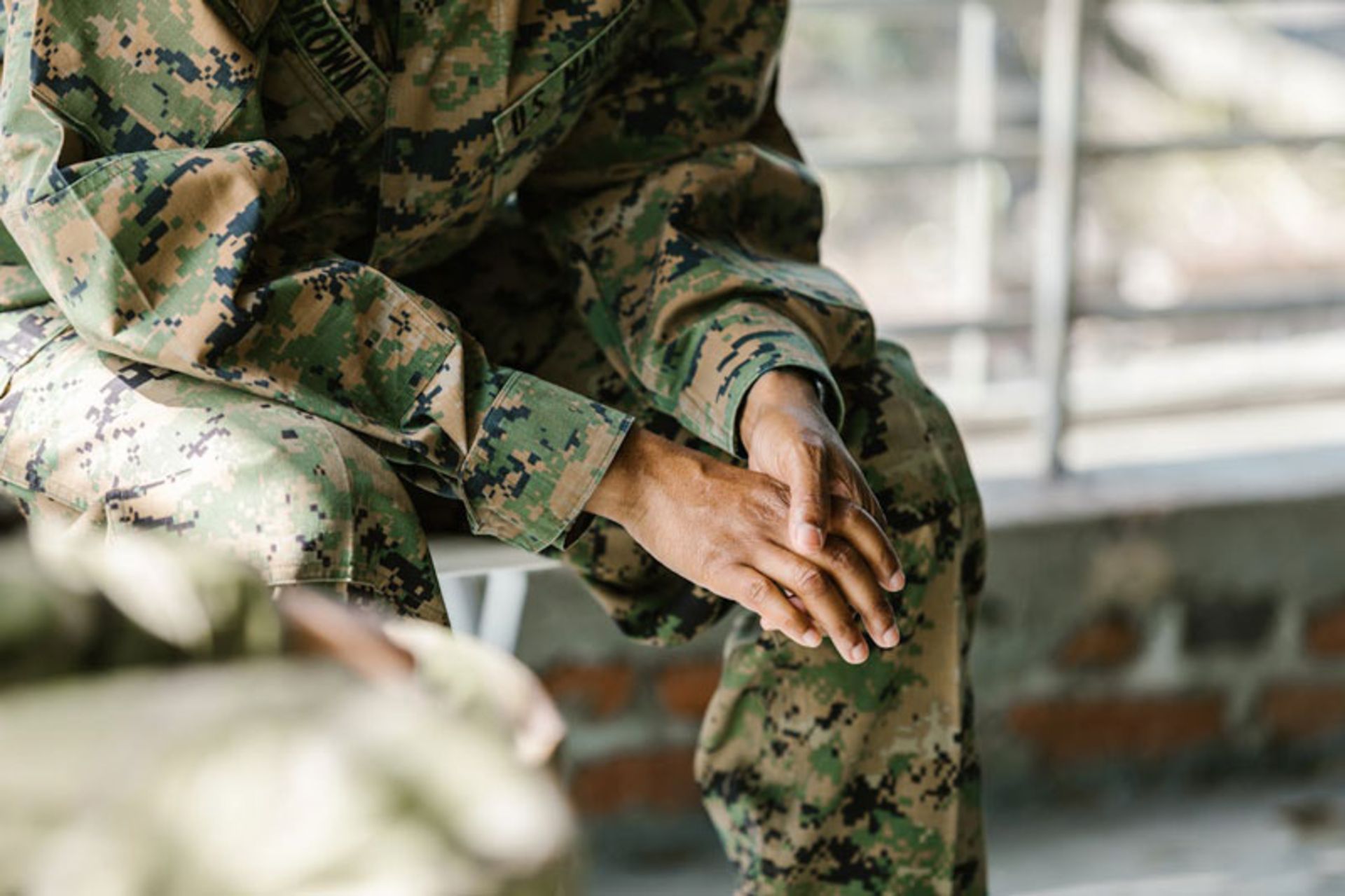 A man in a guerilla pattern 