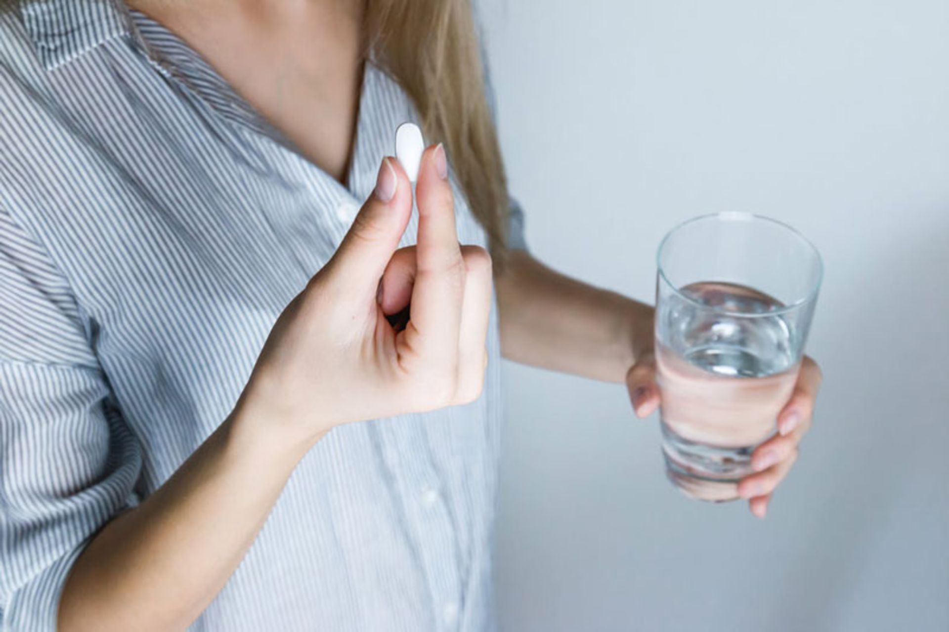 Take the pill with a glass of water