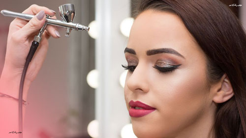 Make-up model with airbrush