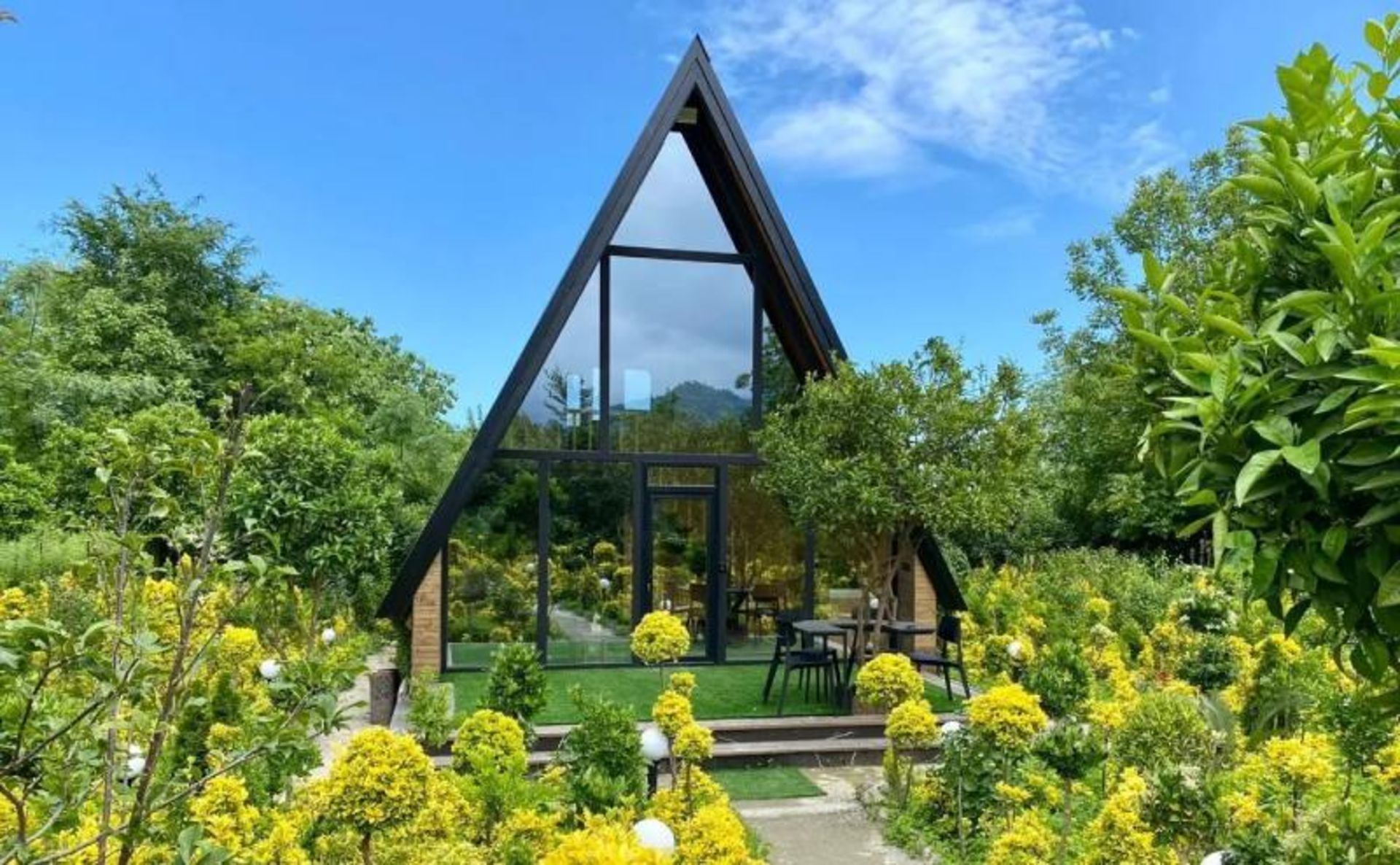 The tree-filled courtyard of Chabaksar's Swiss cottage