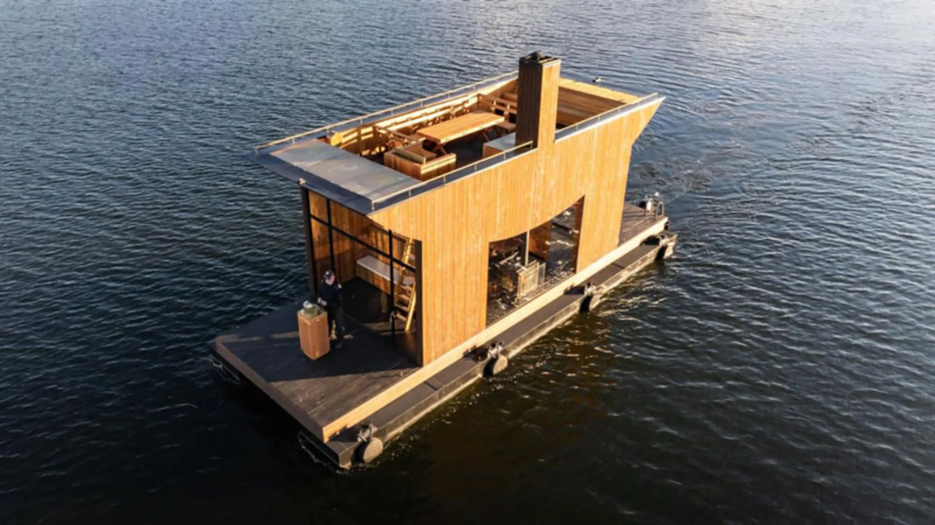 Wooden and floating sauna on the Neris river
