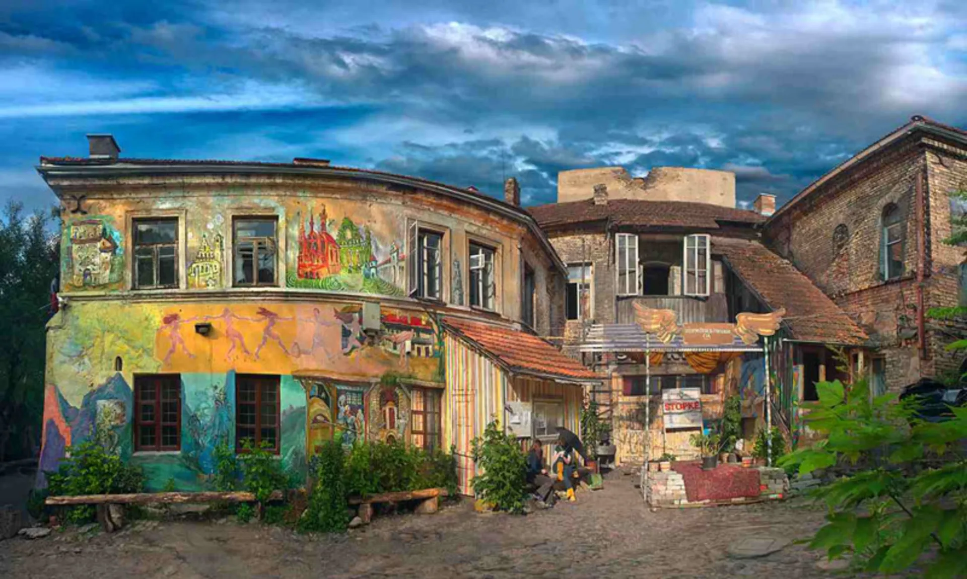 The courtyard of Ojupis Art Developme Ceer with colorful walls in Lithuania