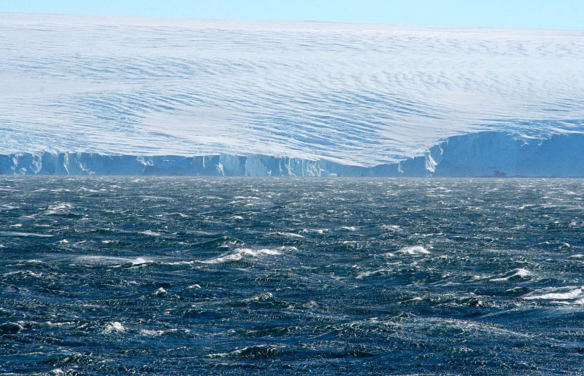 Huge walls of ice against the raging Aarctic Ocean
