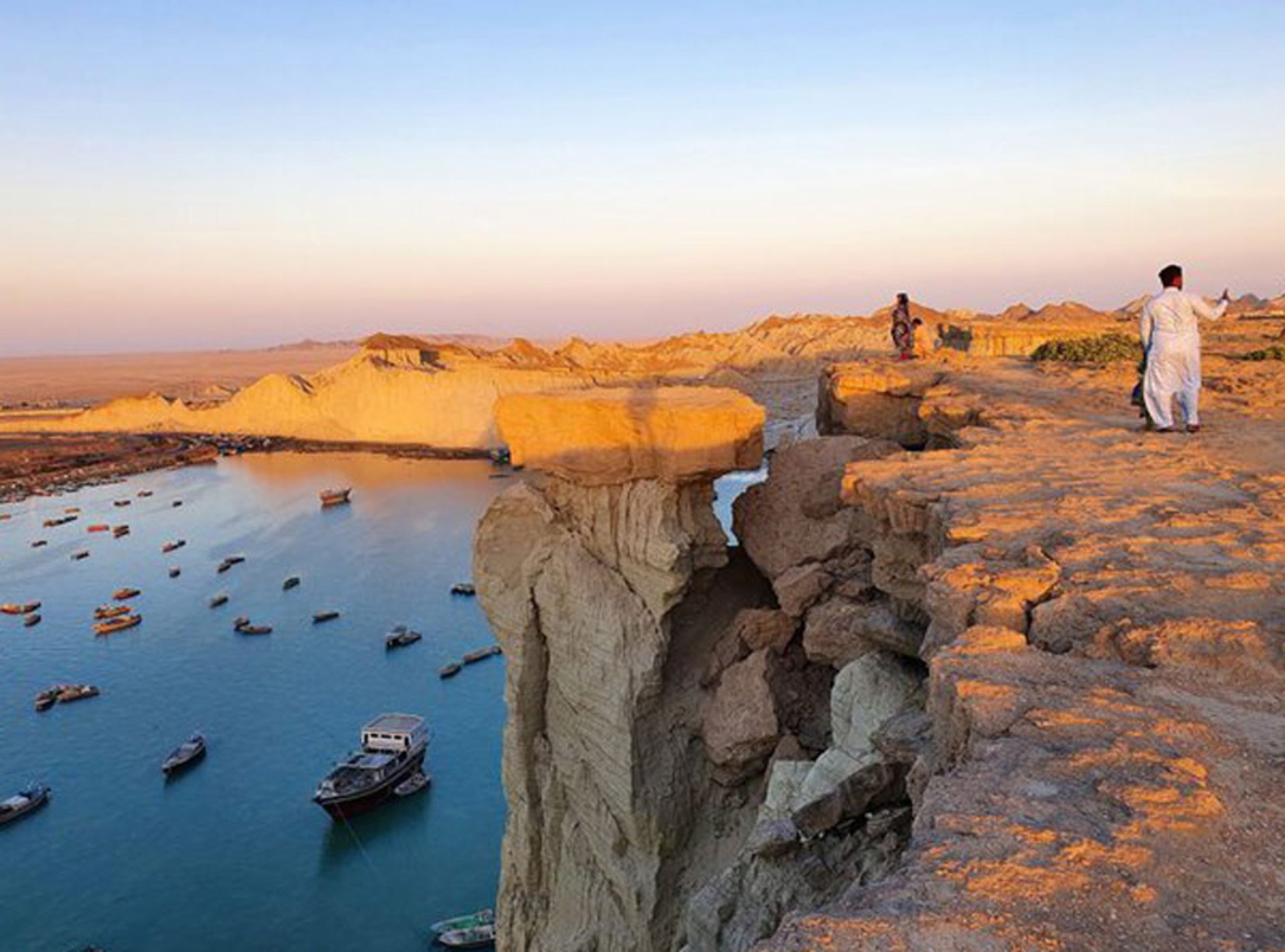 A view of the boats of Brace Wharf from the top of Brace Rock