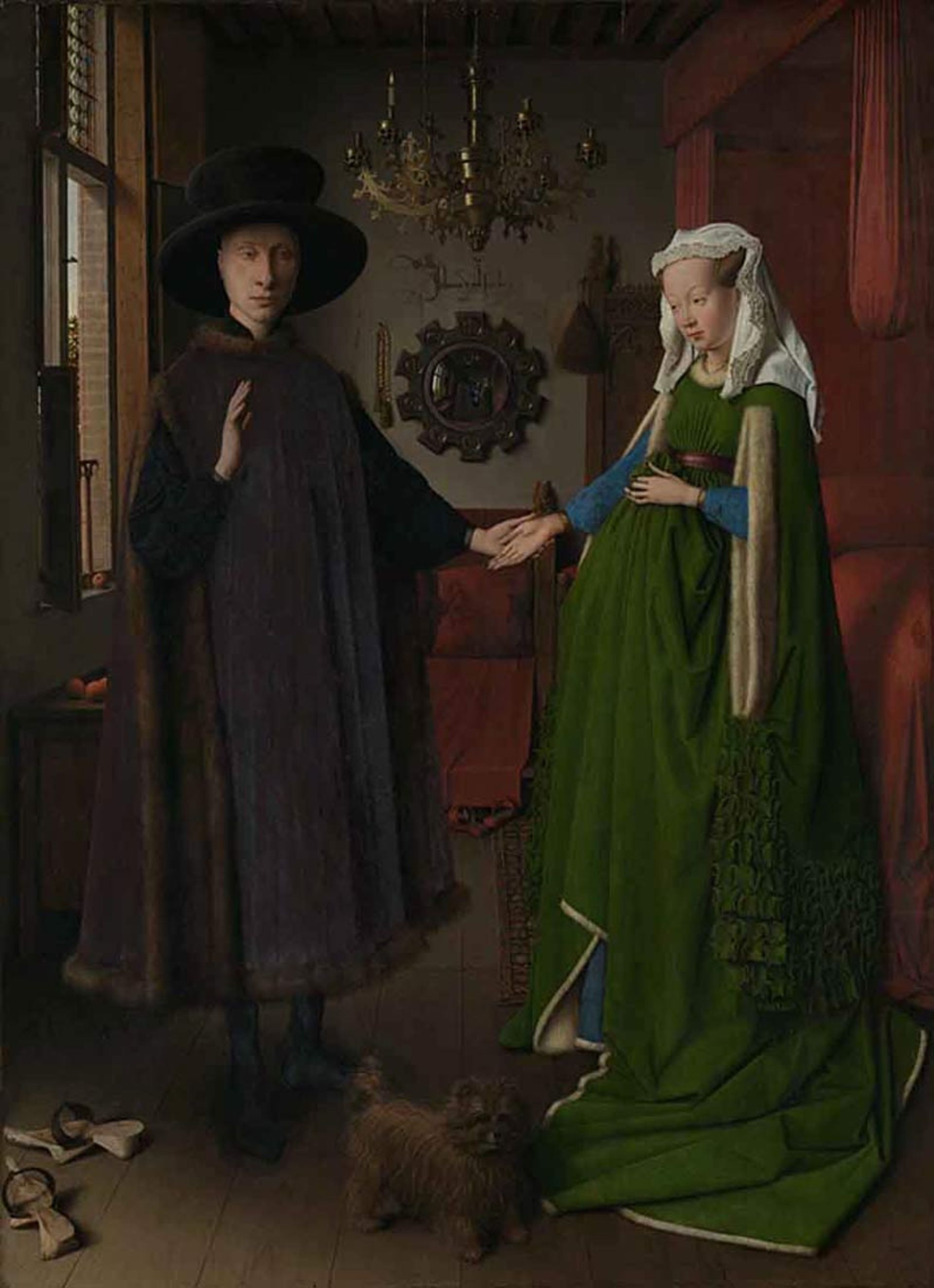 A paiing of a couple in a room with old clothes