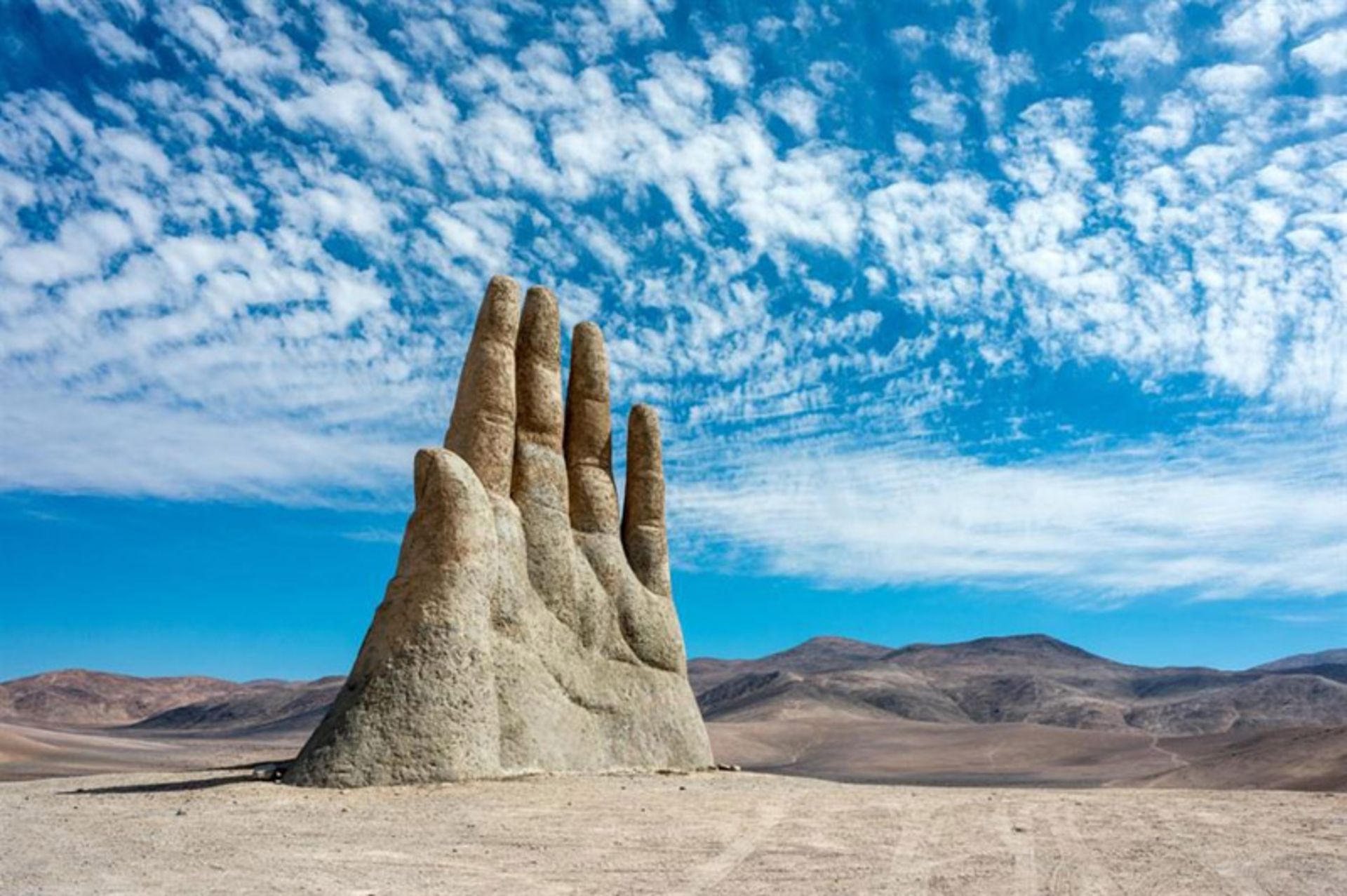 Desert hand art structure, Chile under the sky