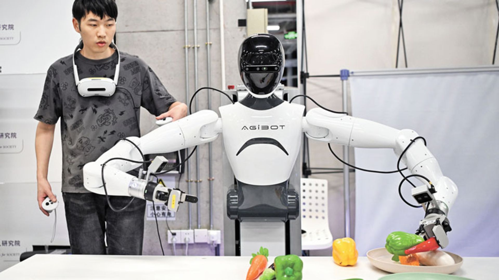 Chinese engineer training a humanoid robot
