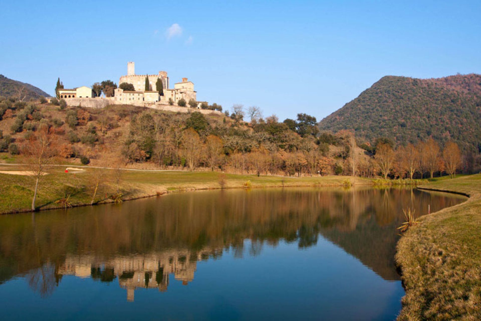 The reflection of the image of Antonola Castle in the water