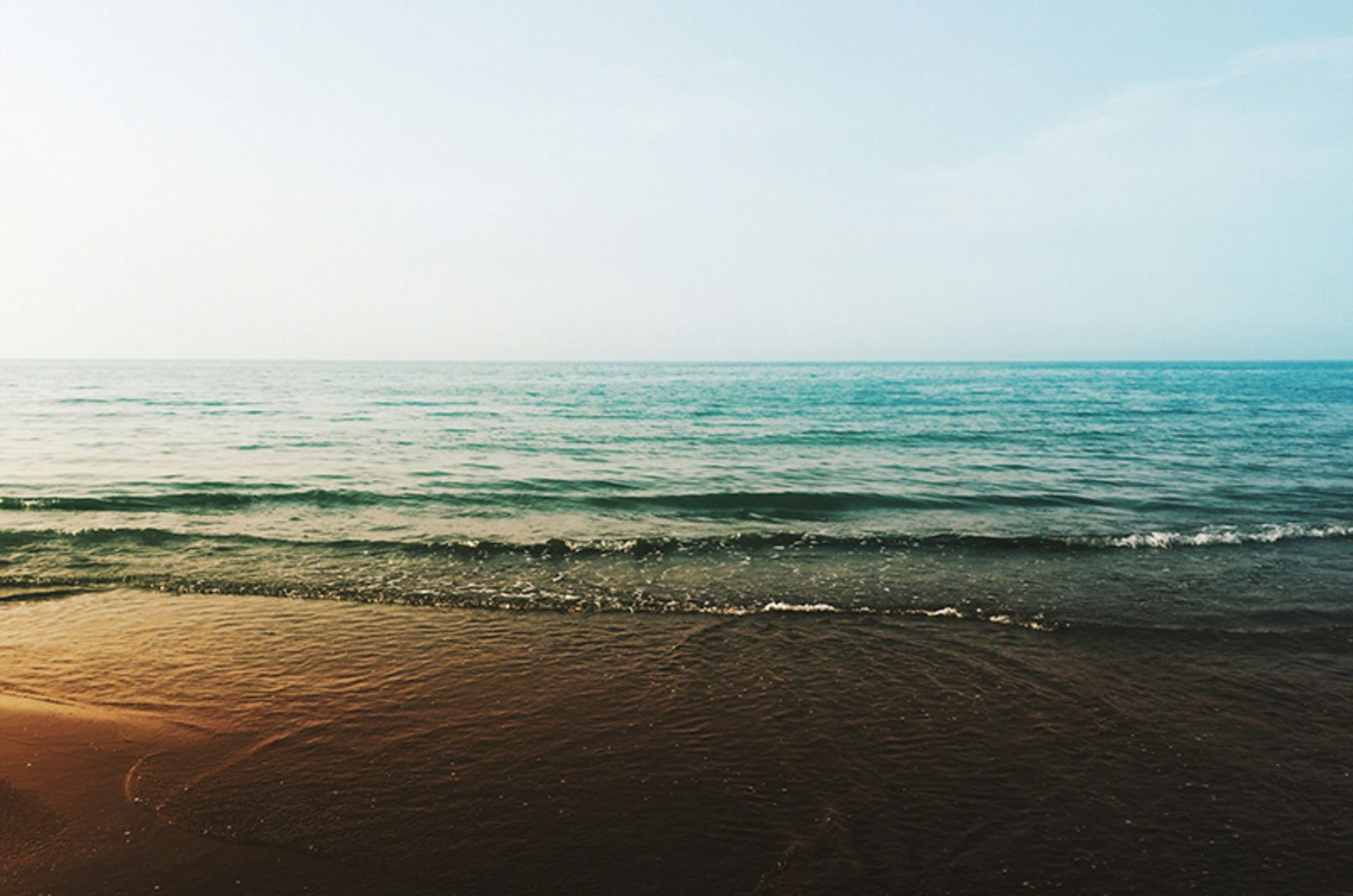 Chabaksar beach and the calm waves of the Caspian Sea