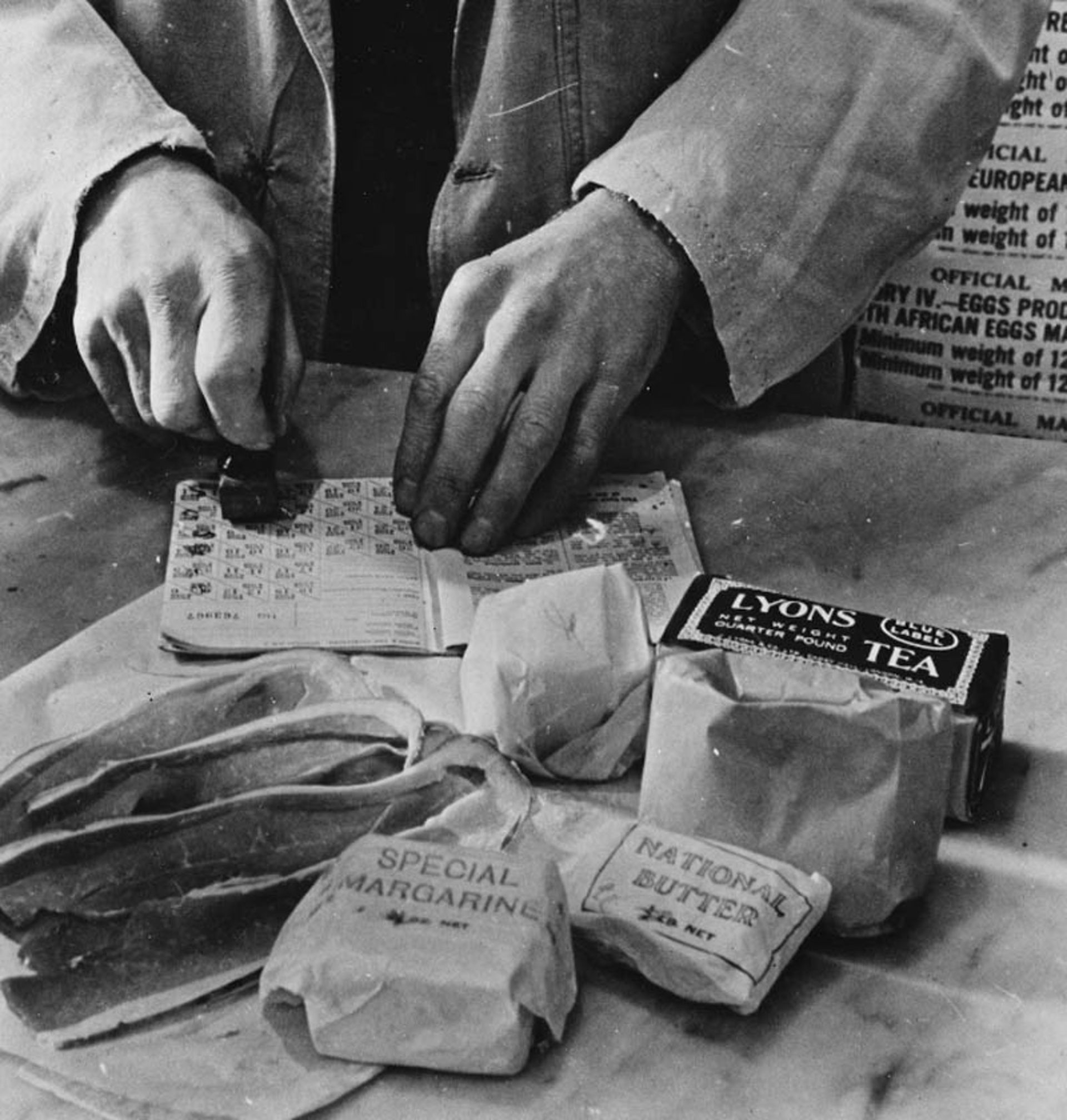 Officer stamping the ration book