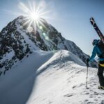 Eskimo athlete climbing a mountain