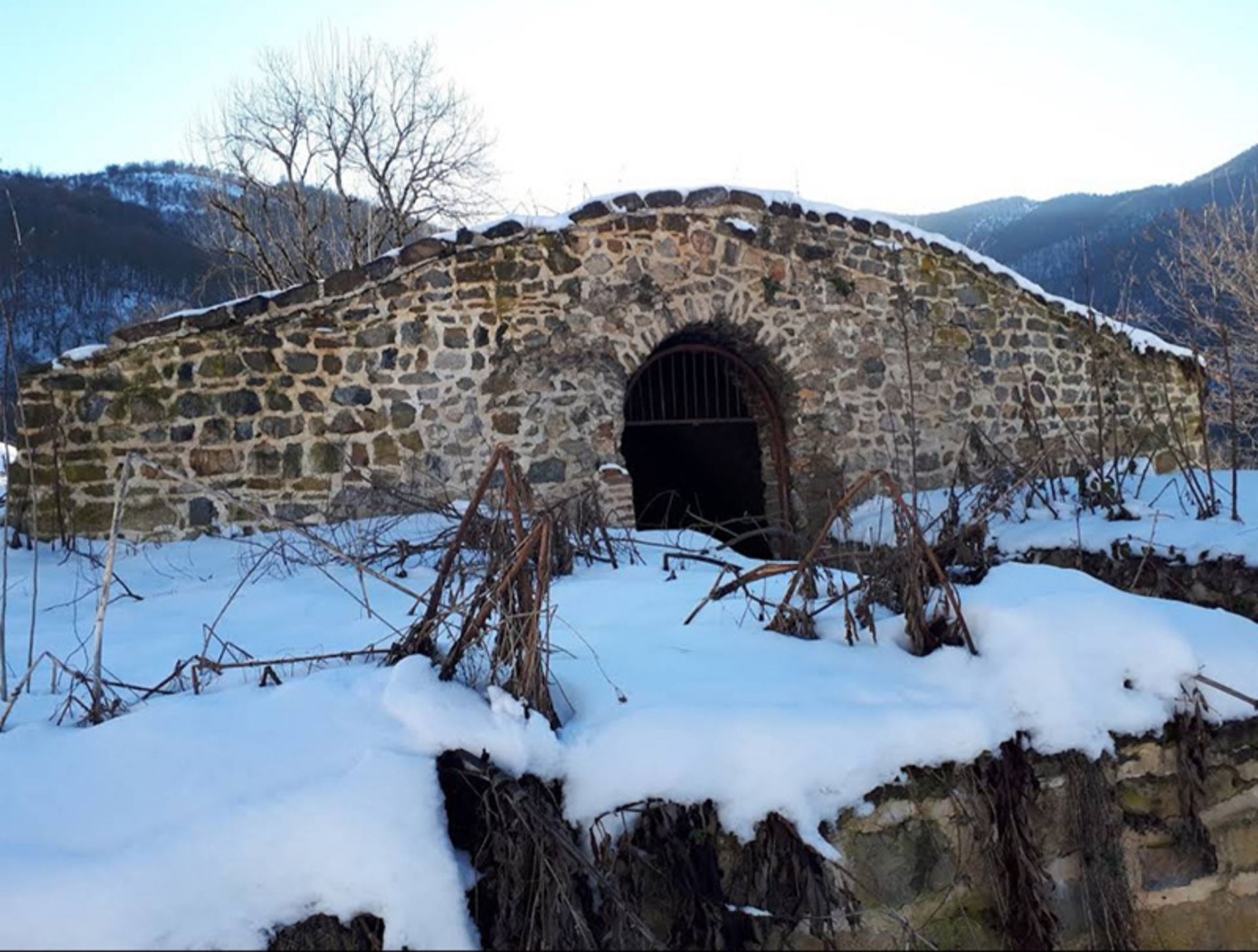 The erance to the stone building of Qazlaq Caravanserai