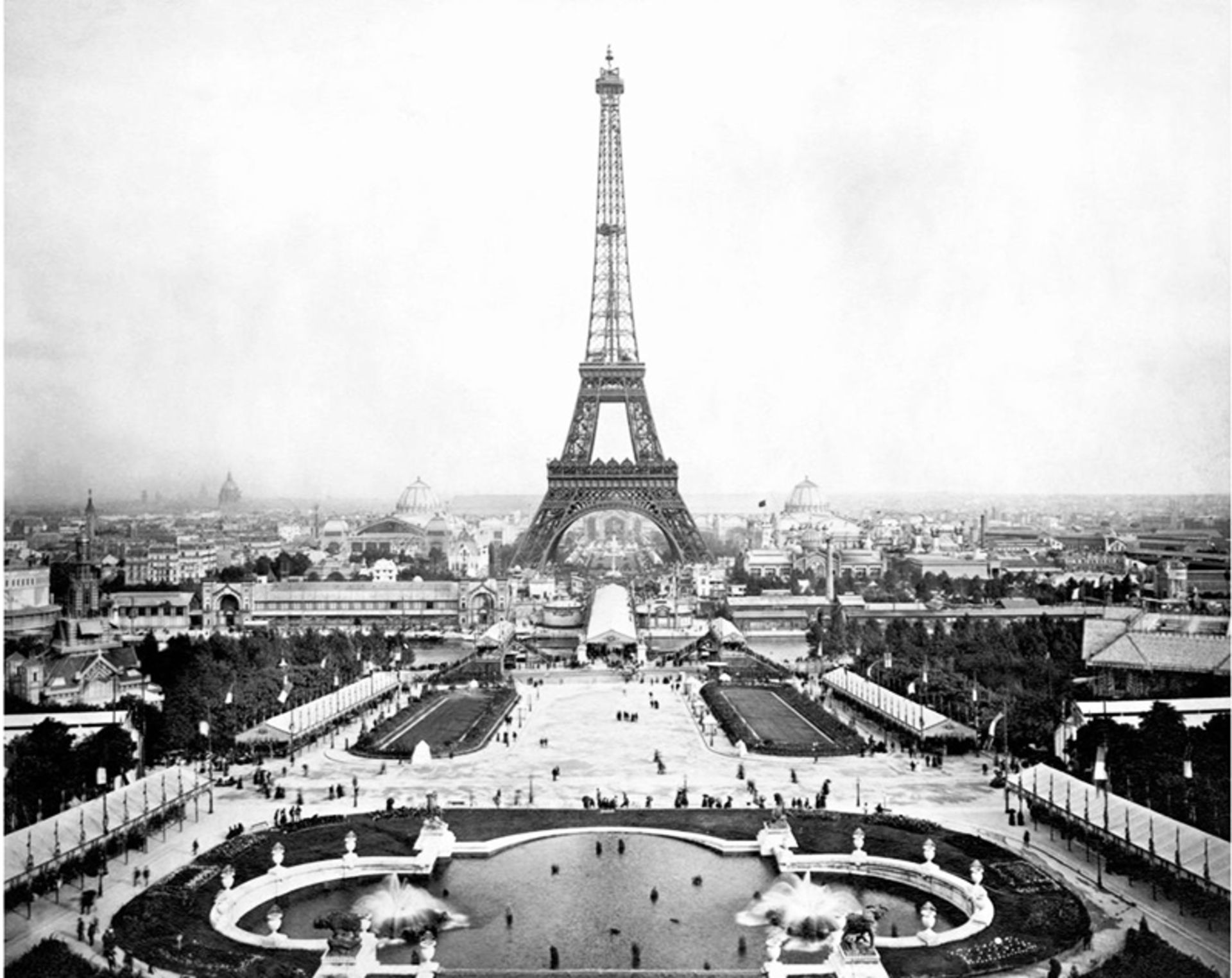 Old and aerial photo of the Eiffel Tower and the surrounding area