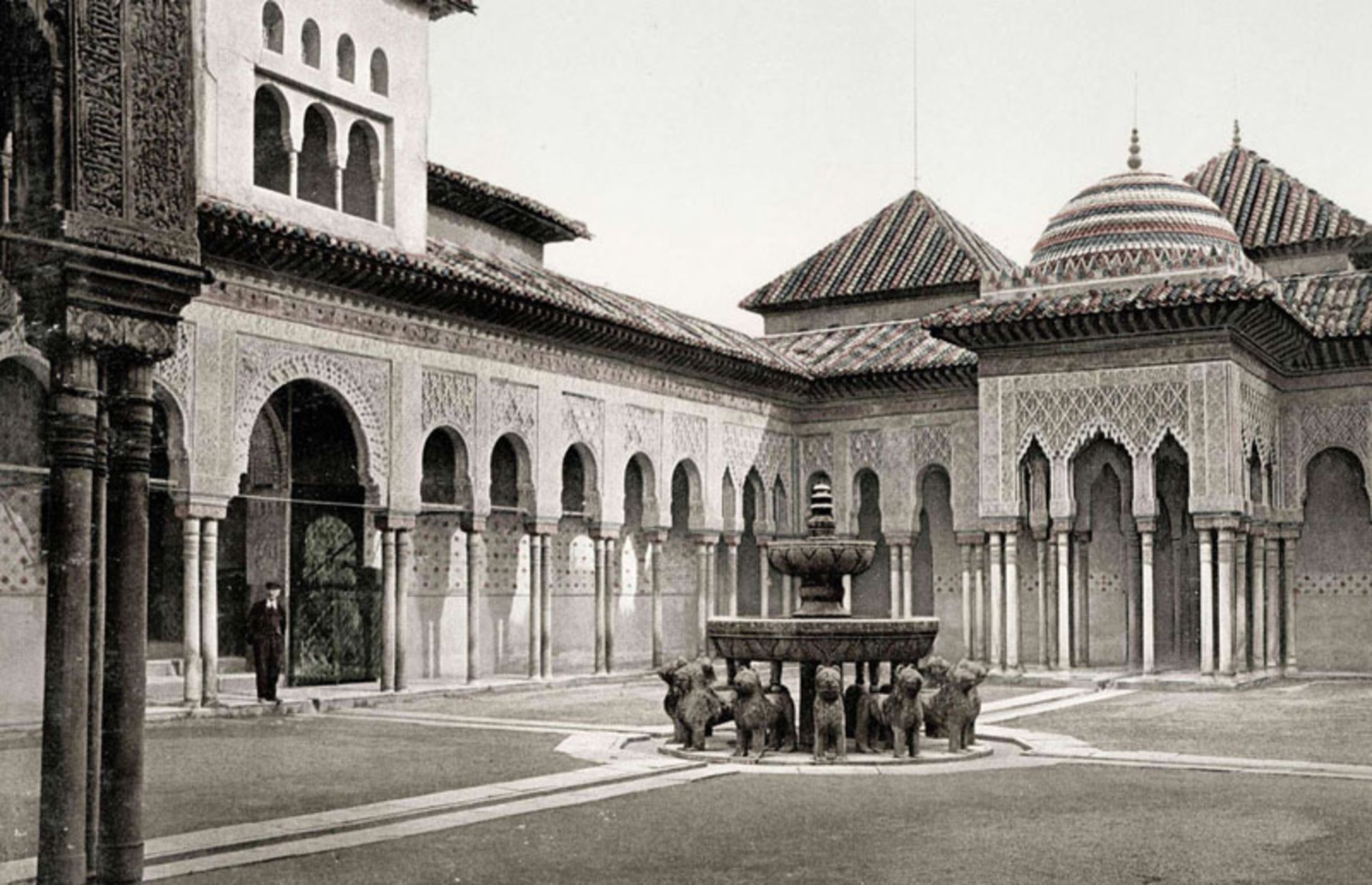 Old black and white photo of Alhamra Palace grounds and historical monume
