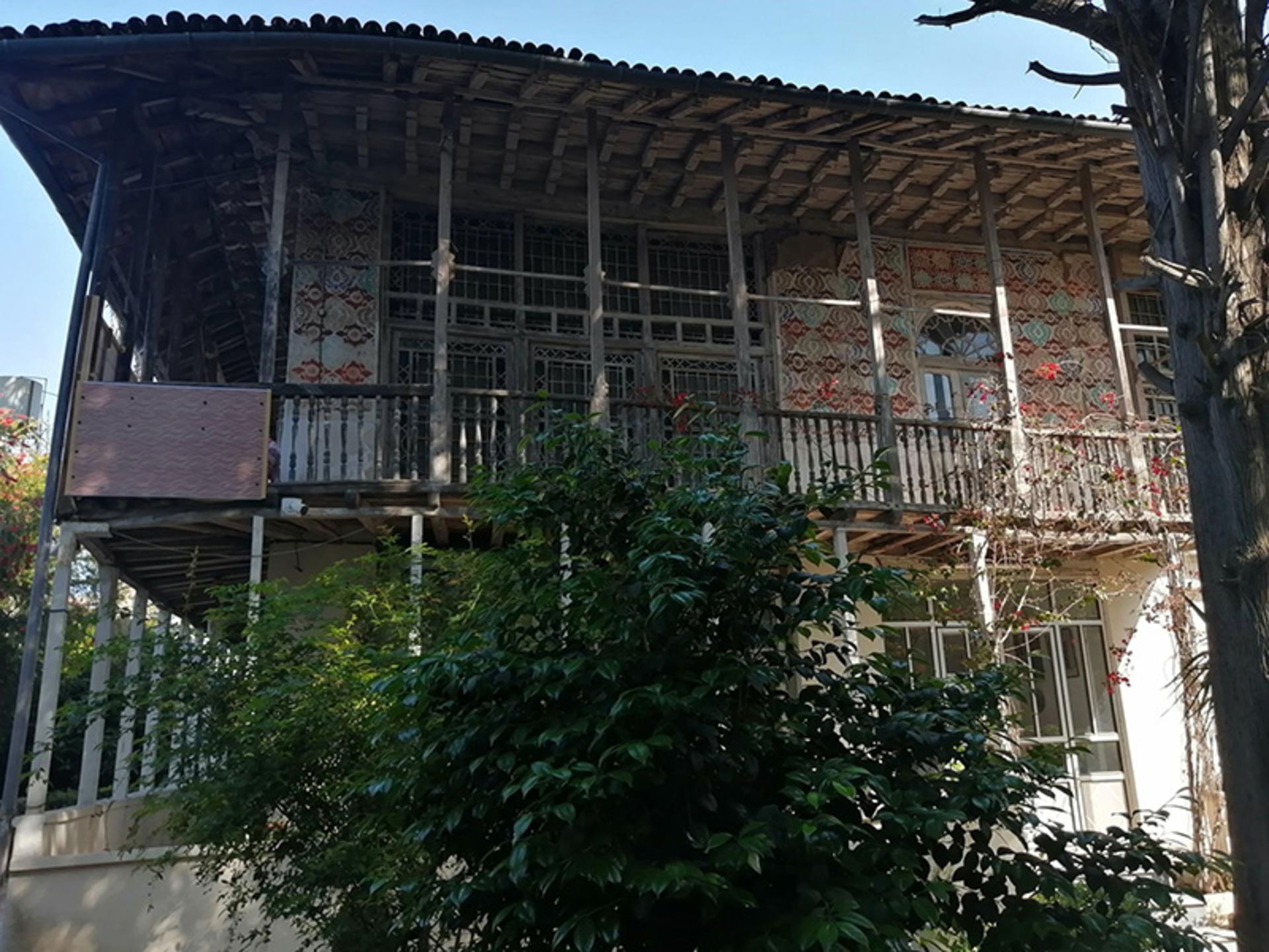 The courtyard and the beautiful building of Manjem Bashi's house in Langrud