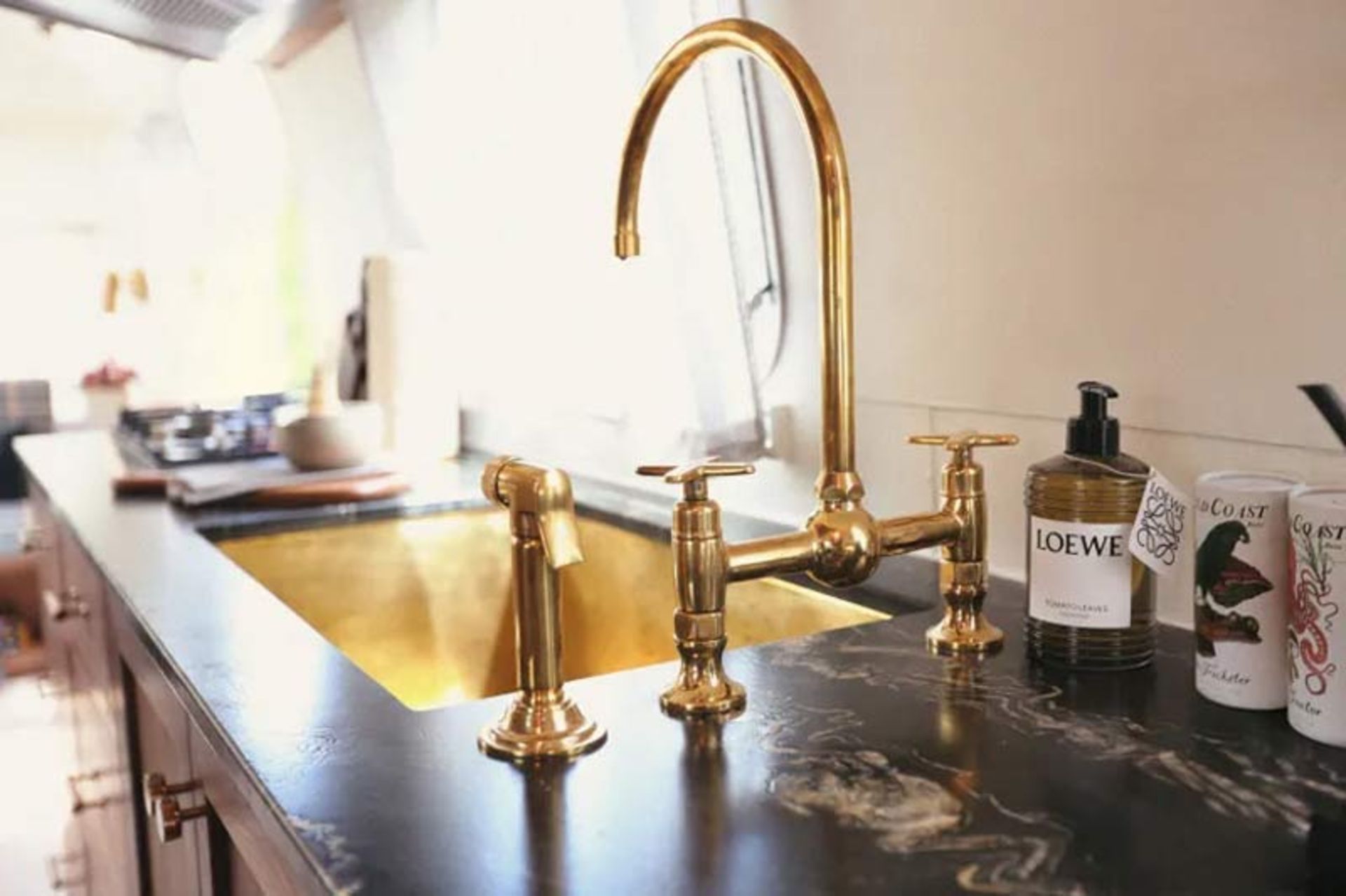 Luxury brass faucets and golden sinks in the exclusive restoration of old caravans