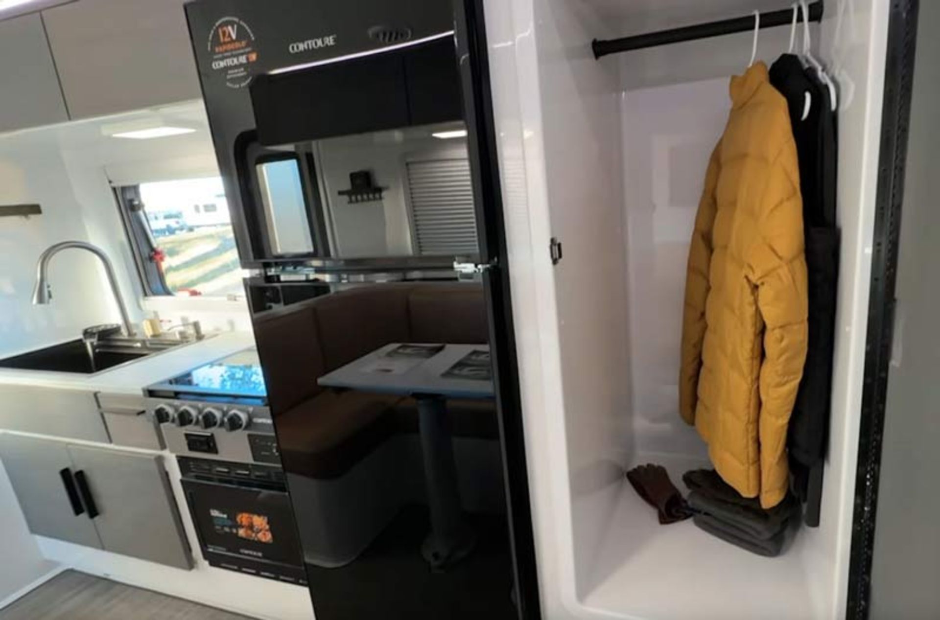 A view of the smart wardrobe and storage space inside the cabin